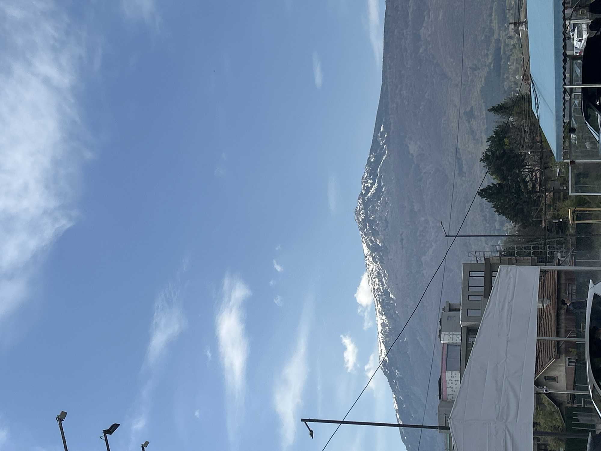 Mountain view captured from urban Sofia under cloudy skies