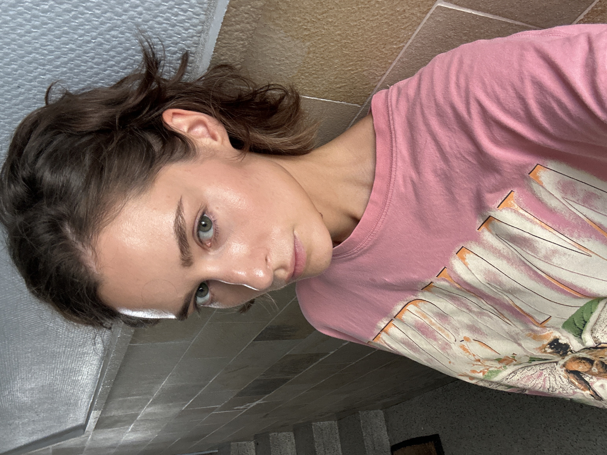 Elevator selfie series in Kiel, pink graphic tee throughout