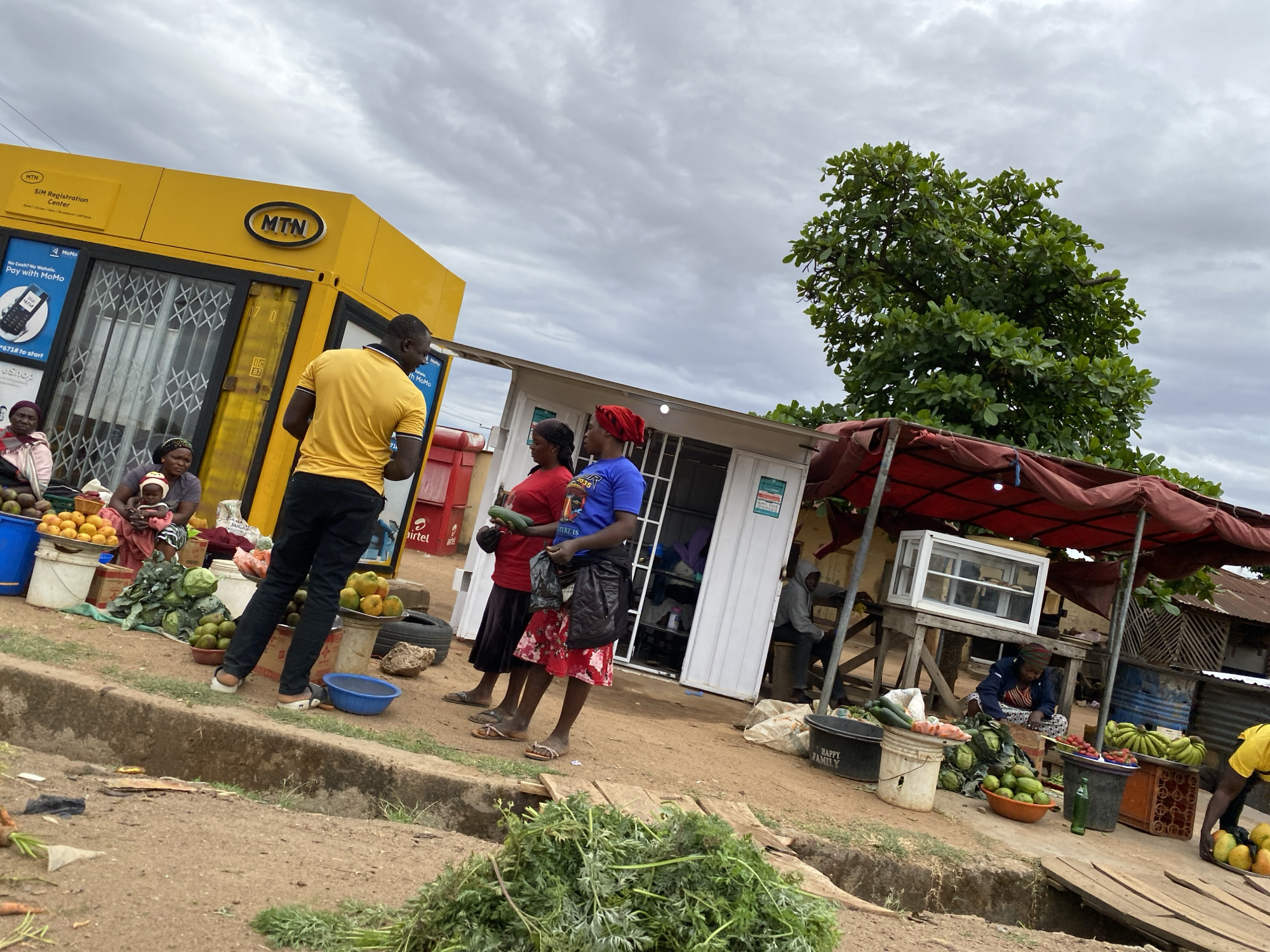 Market scene and mirror selfies captured in Bukuru, Nigeria