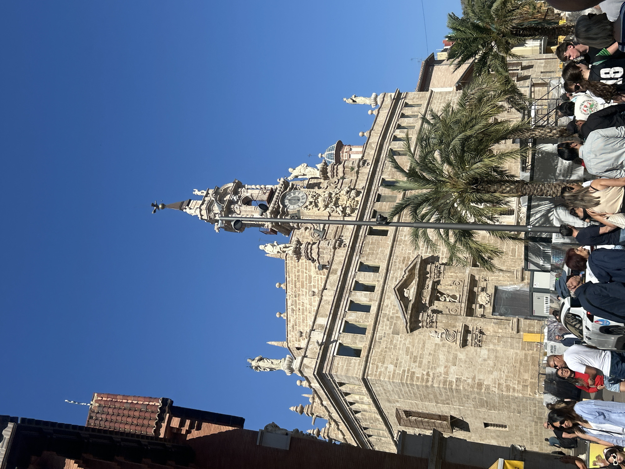 Morning architectural documentation in Valencia captures historic church, residential building