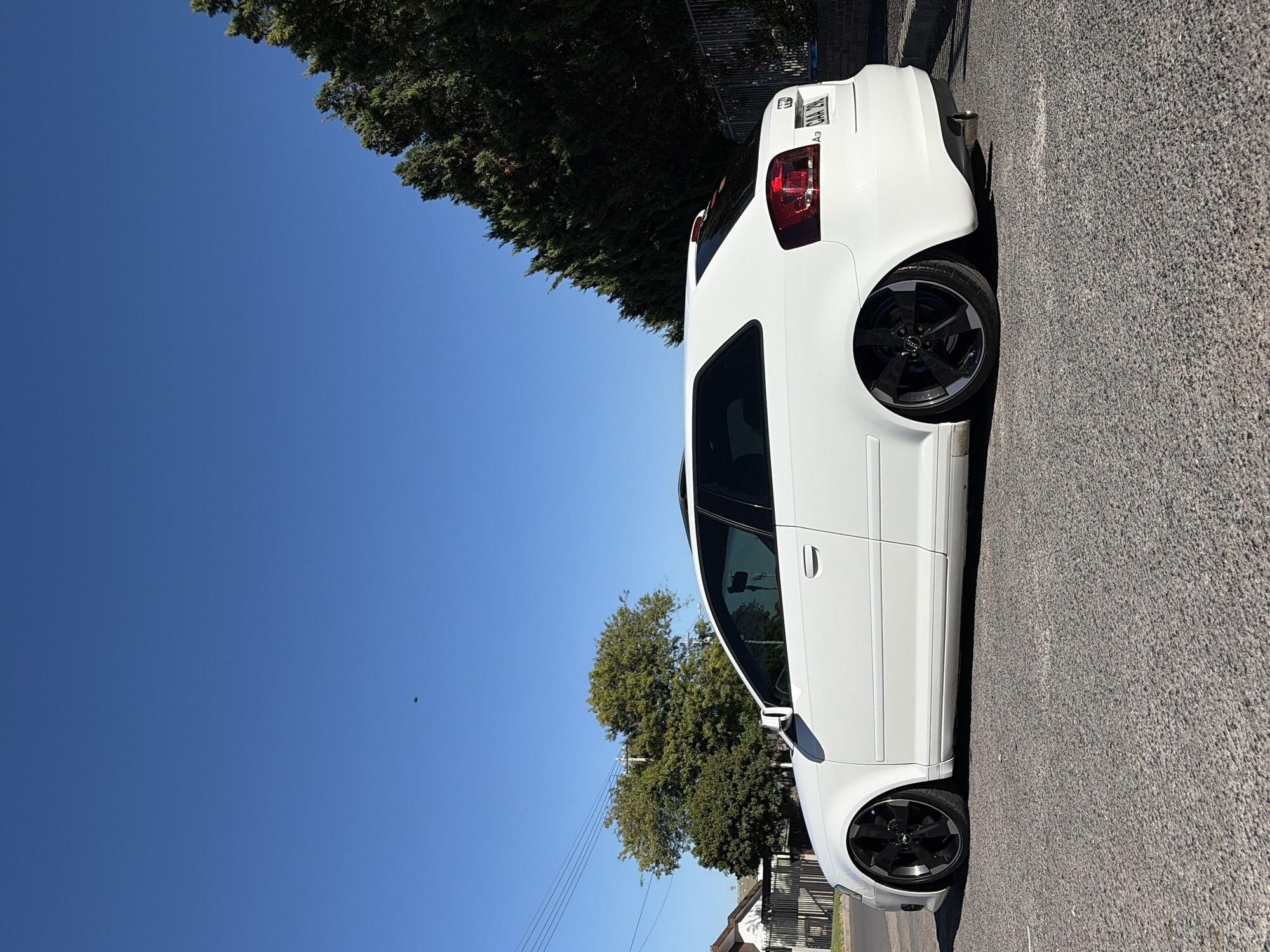 White Audi A3 parked in Parow under clear skies