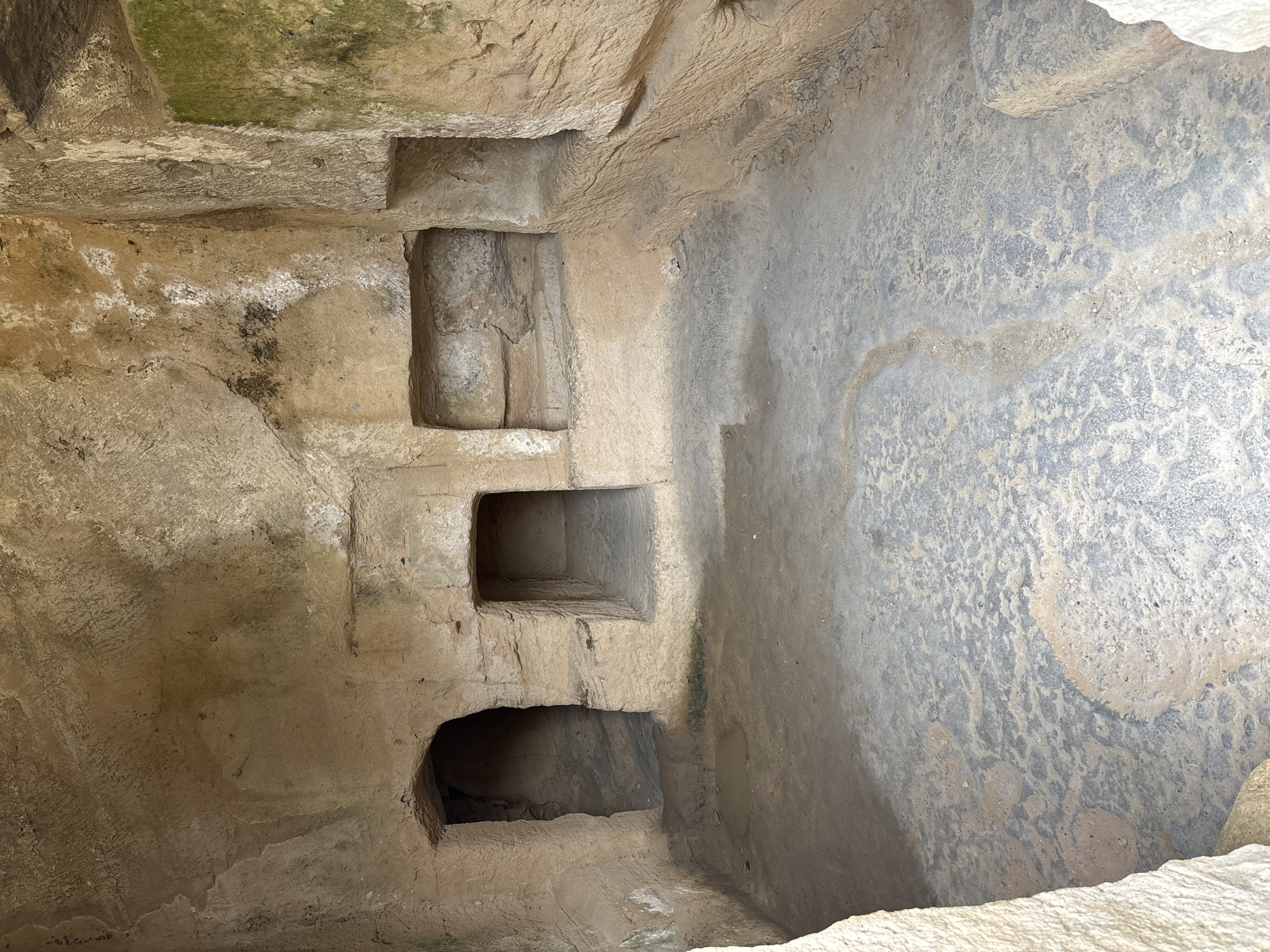 Visitor explores ancient tombs and coastal landscapes in Paphos