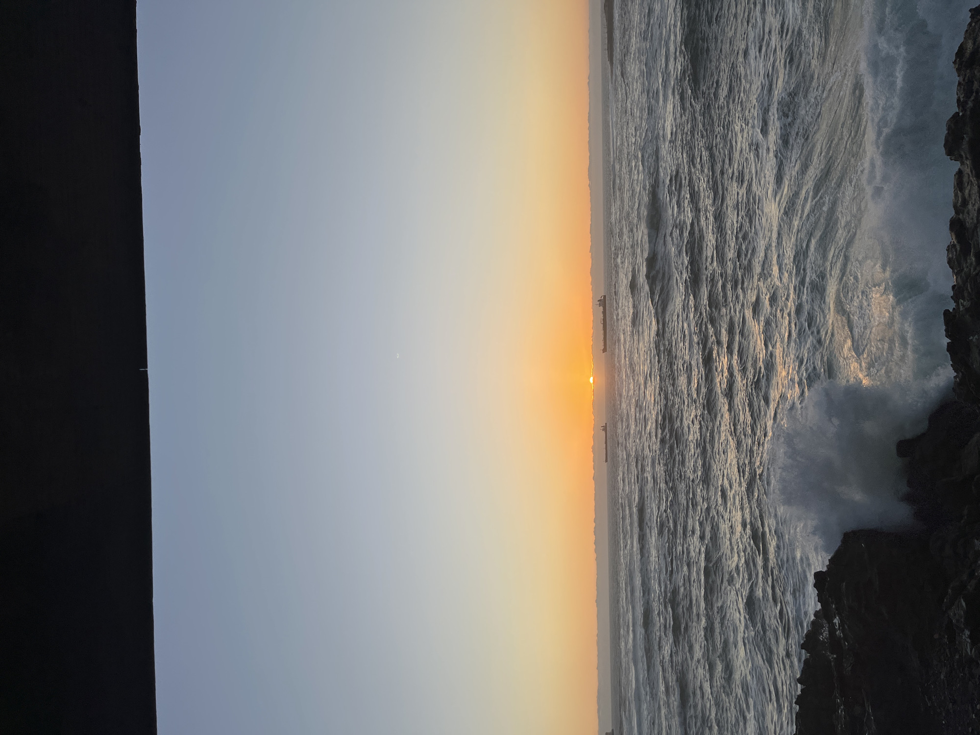 Sunset observed over Pacific Ocean from Arica, Chile coastline