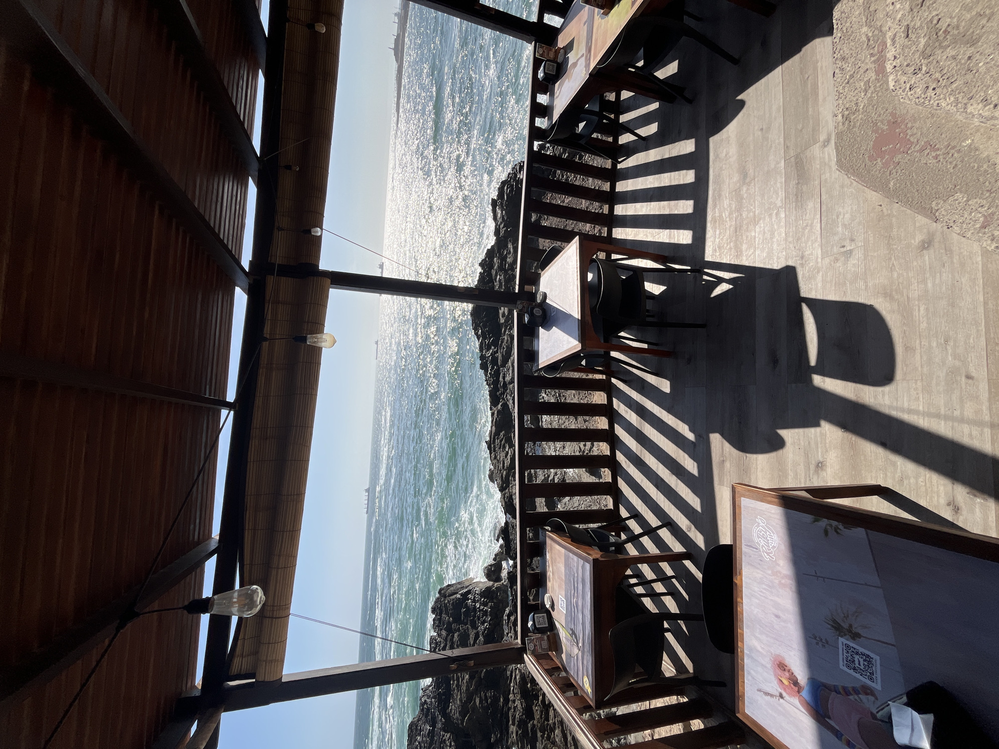 Oceanfront restaurant documented in Arica, Chile evening hours