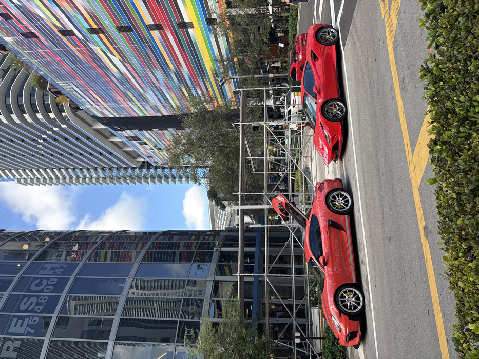 Evening scenes of red Porsche and bakery in downtown Miami