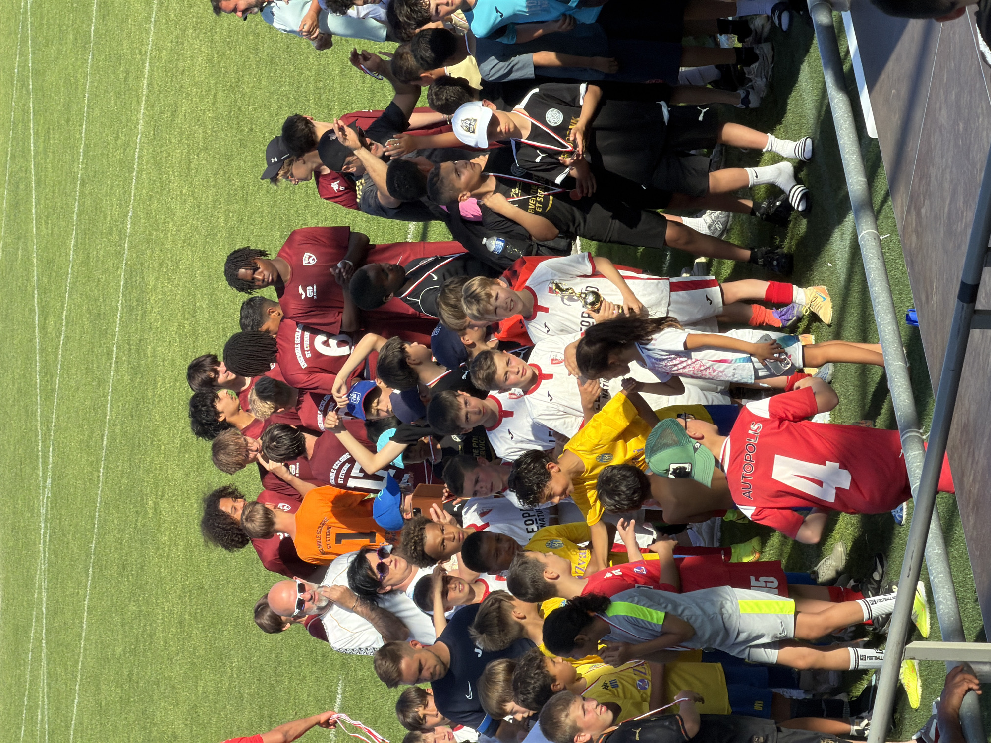 Youth soccer teams gather on field in Fentange