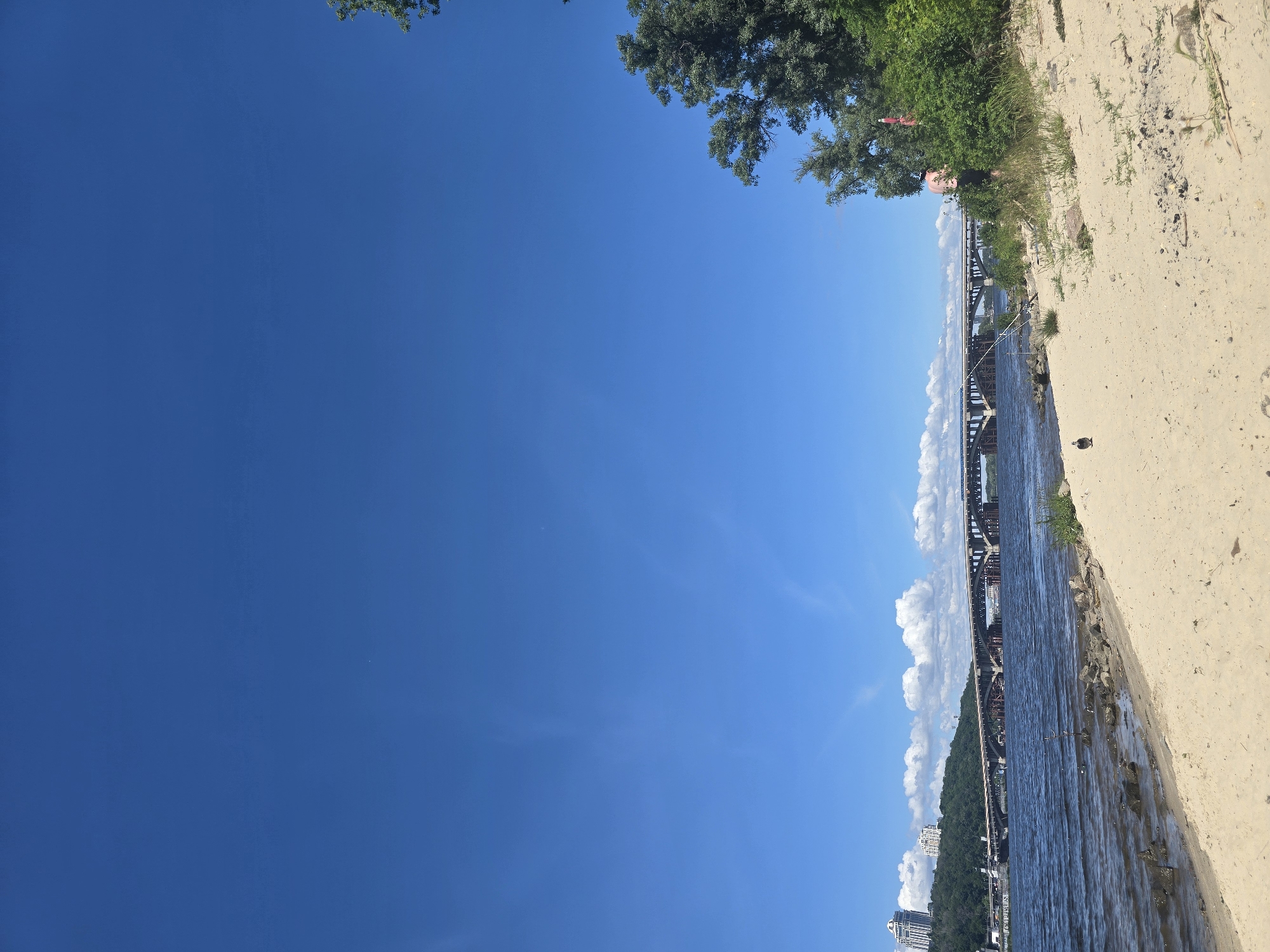 Sunbathing on the Dnieper riverbank, Kyiv