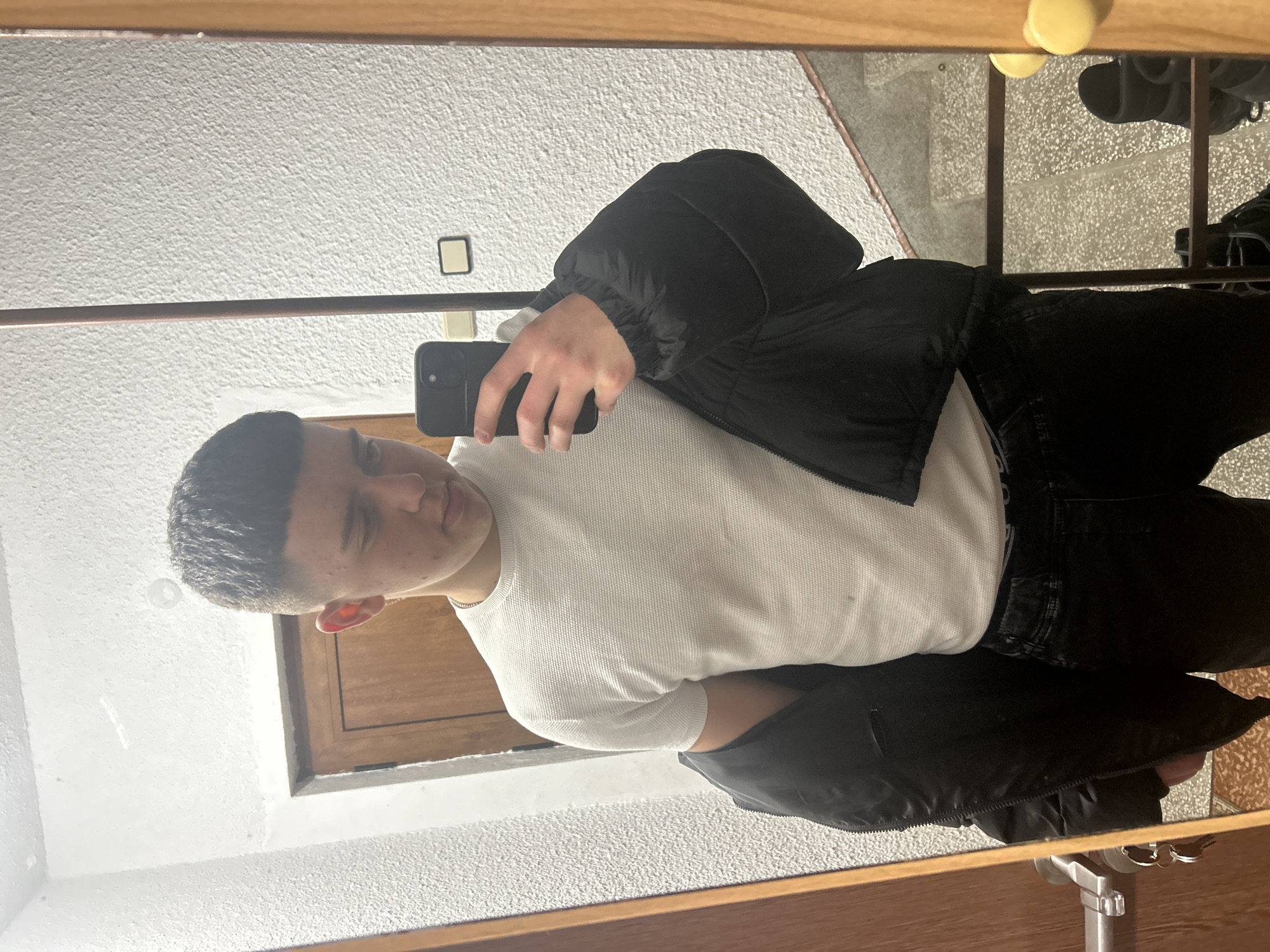 Young man takes mirror selfie in Zlatograd, Bulgaria