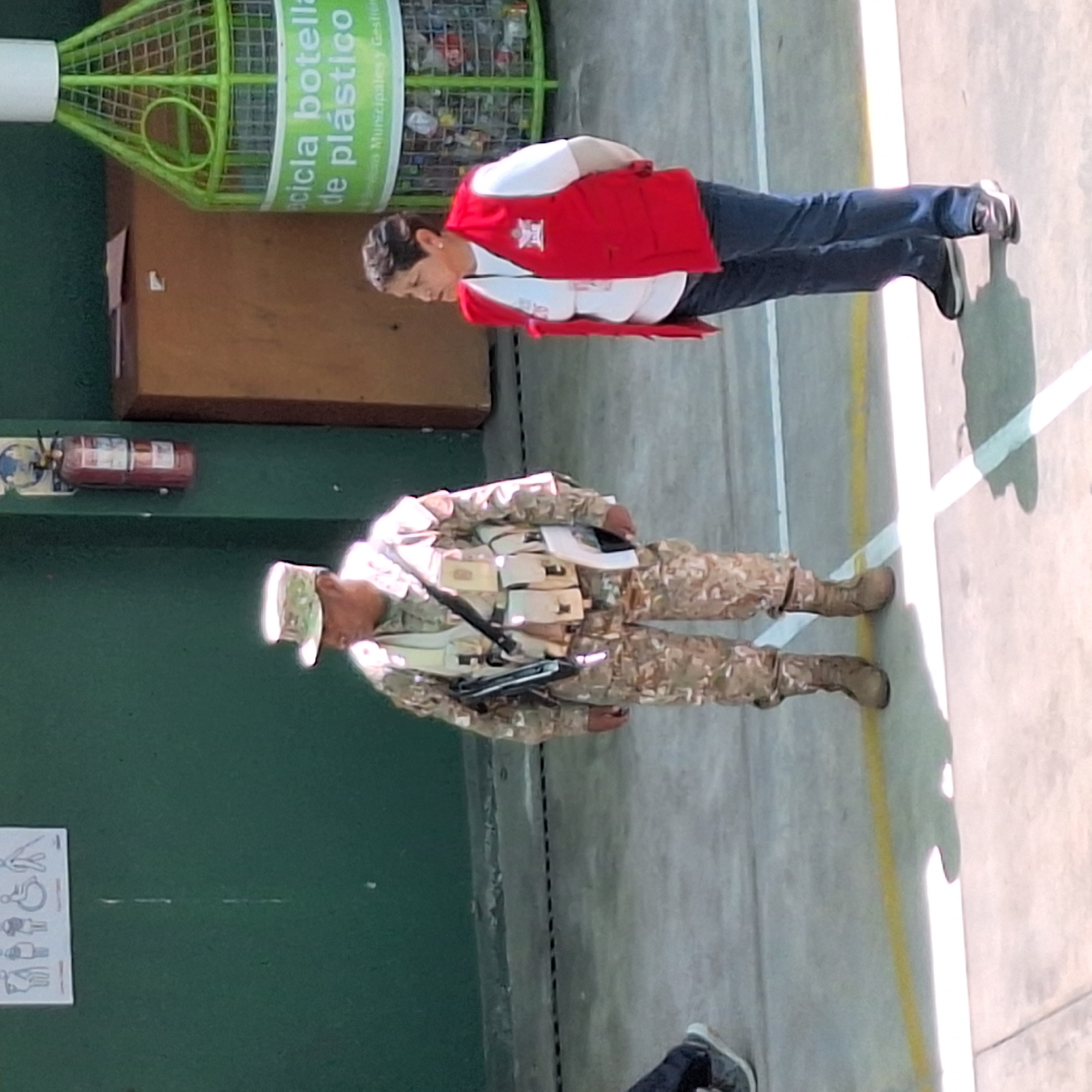 Armed soldiers secure voting station in Mariano Melgar, Peru