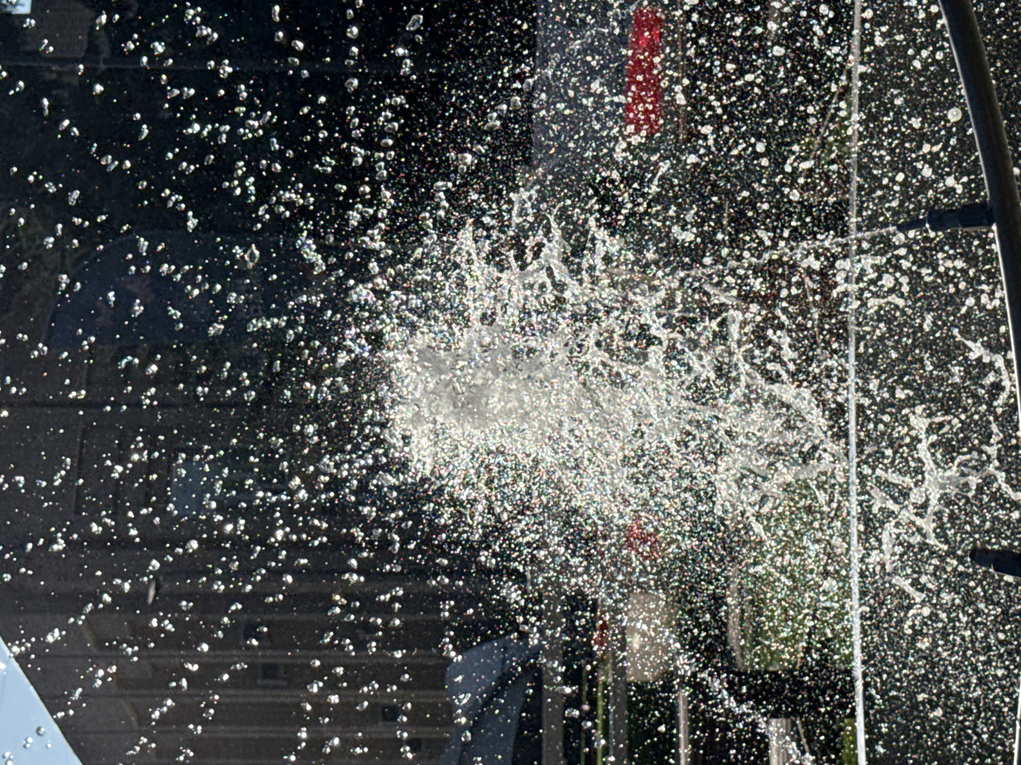Khimki's public art fountain and waterfront on a summer afternoon