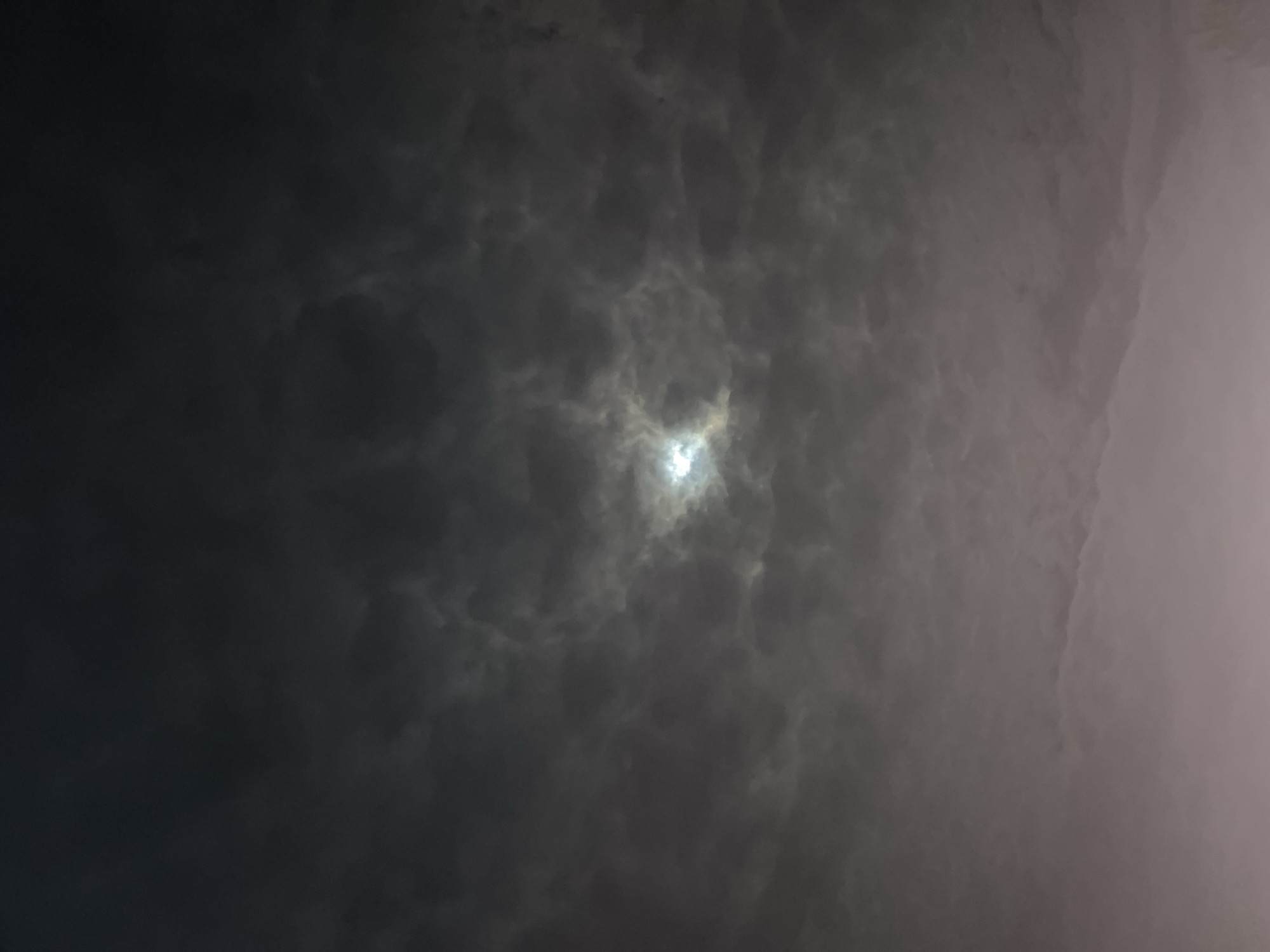 Bright celestial object pierces heavy clouds over Kotel, Bulgaria