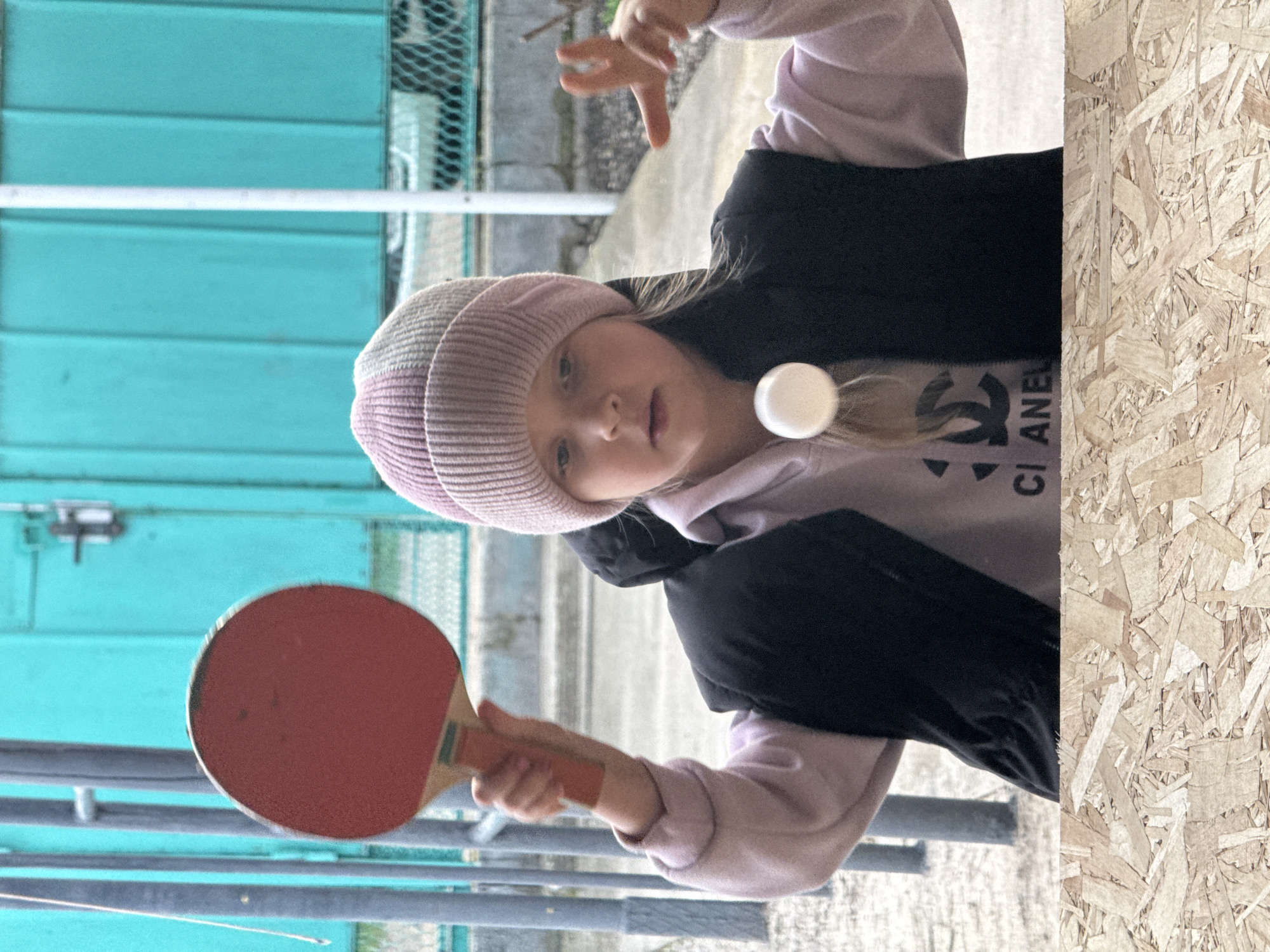 Girl plays outdoor ping pong in Besskorbnaya, Russia