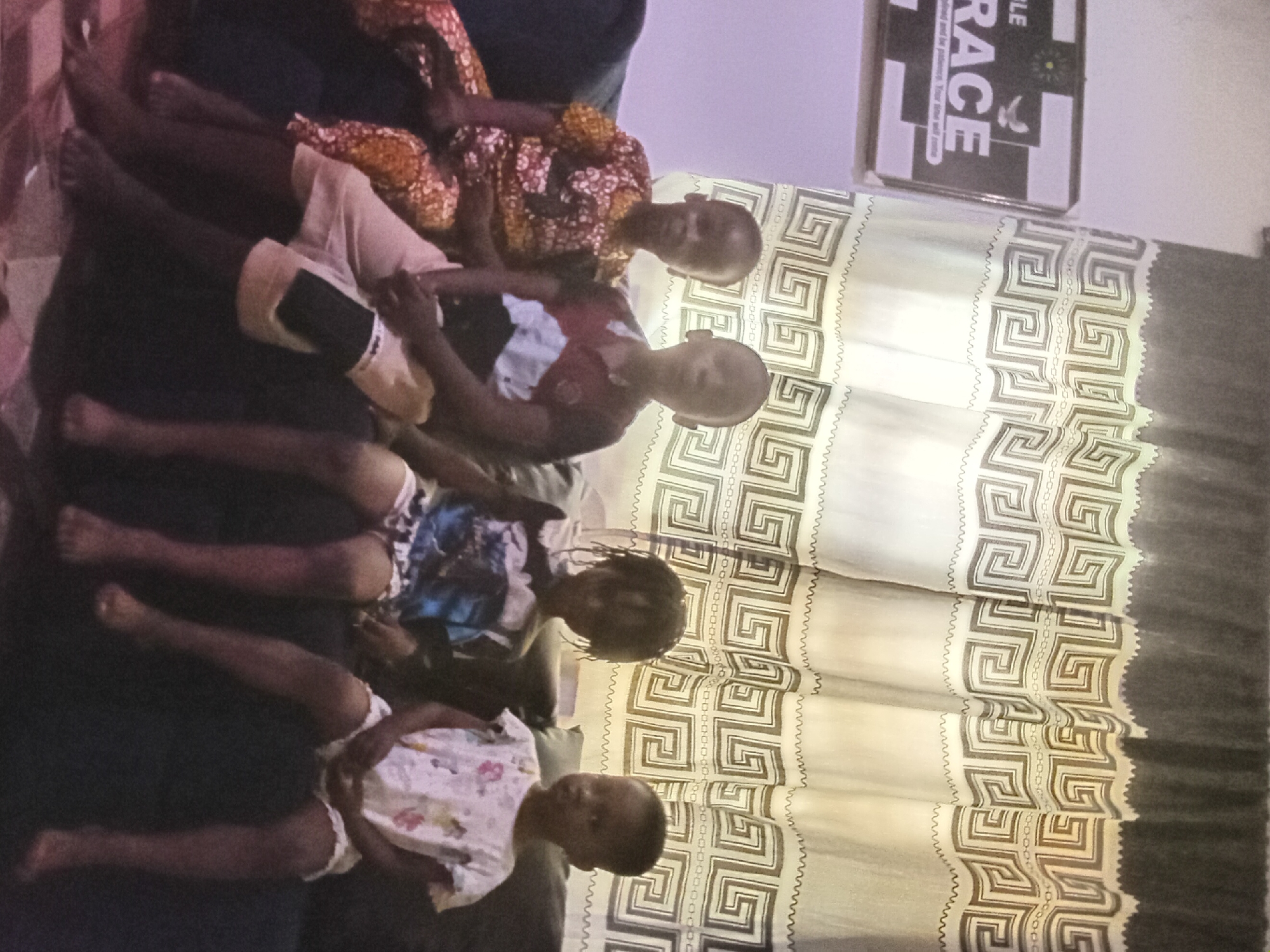 Indoor family portraits and household scenes documented in Shagamu