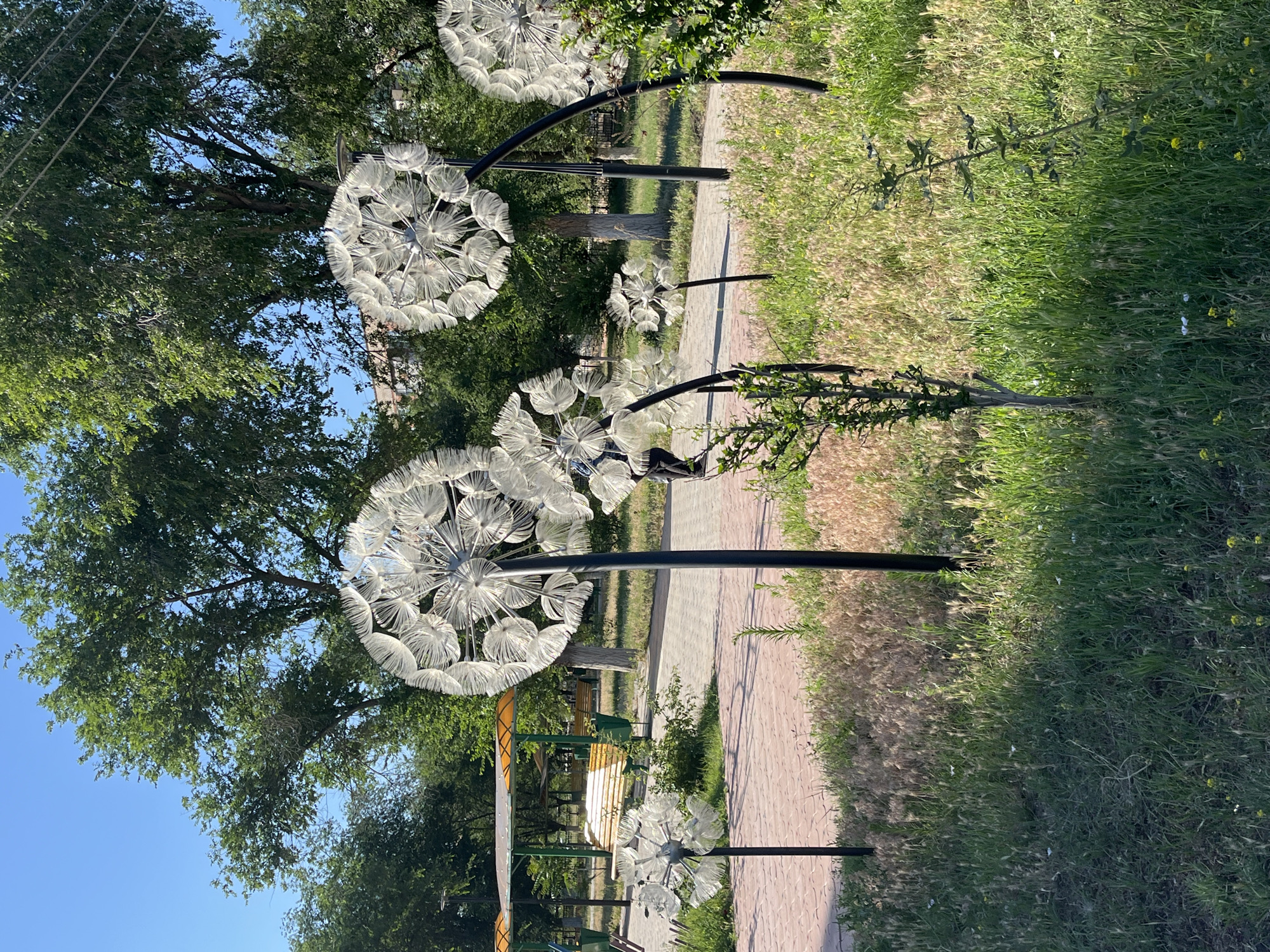 Dandelion sculptures and park details in Krasnyye Barrikady
