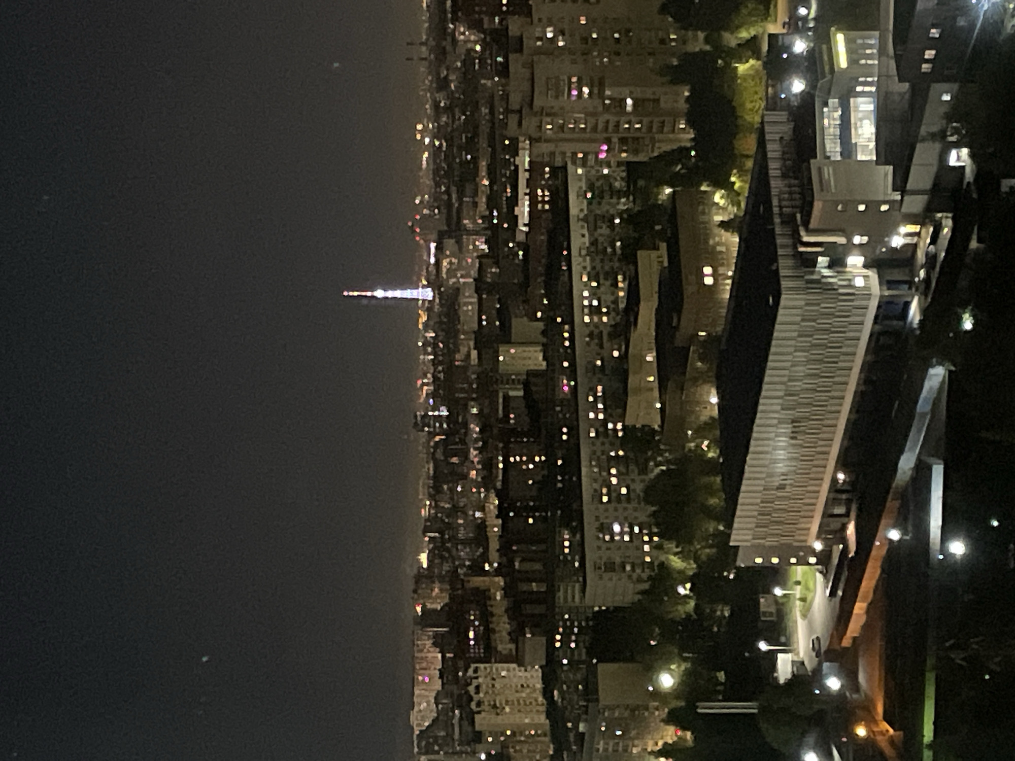 Russian city at night: towers, traffic, construction, and lit-up high-rises