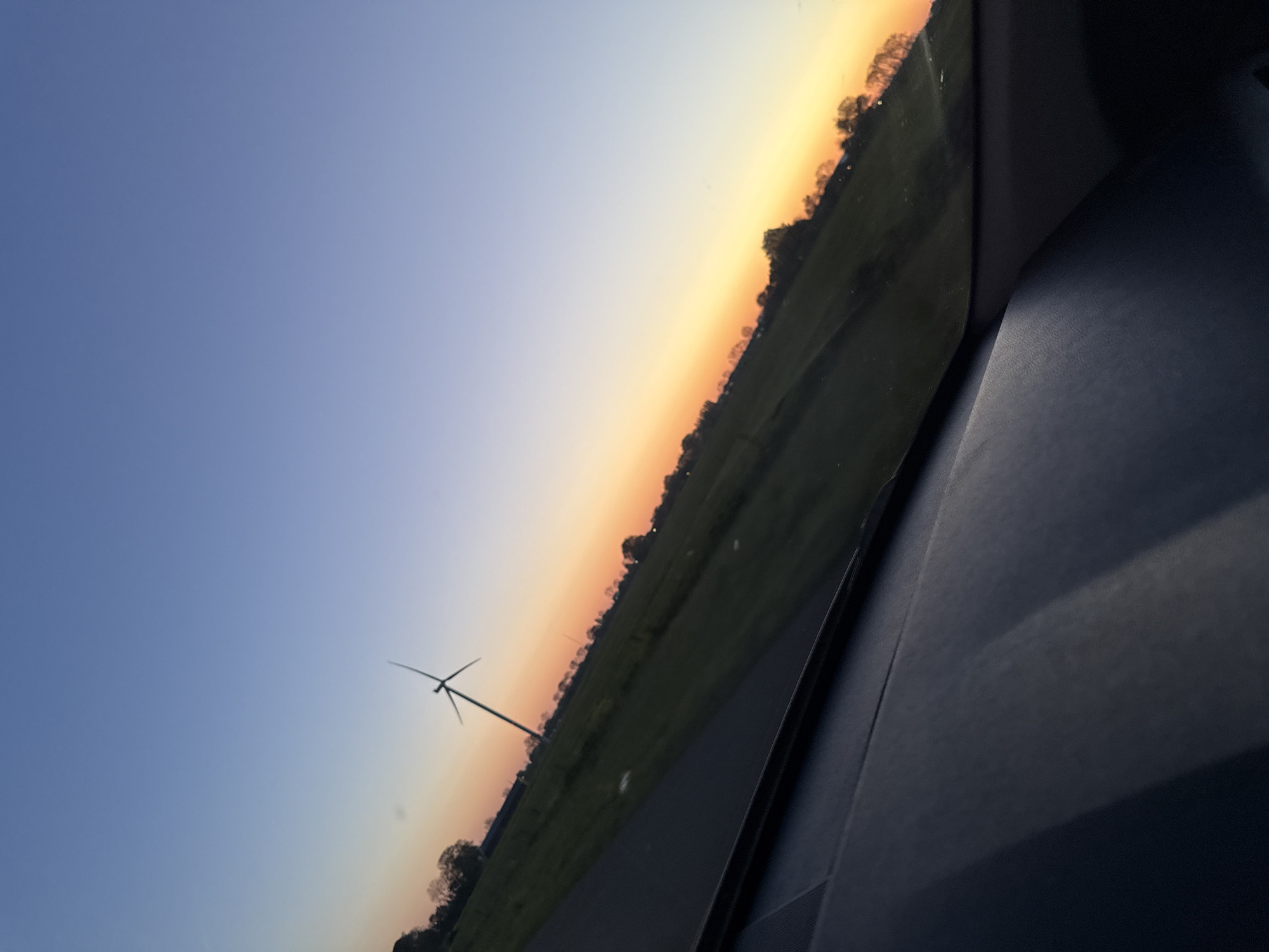Twilight rural landscape photographed from vehicle near Bruchem, Netherlands