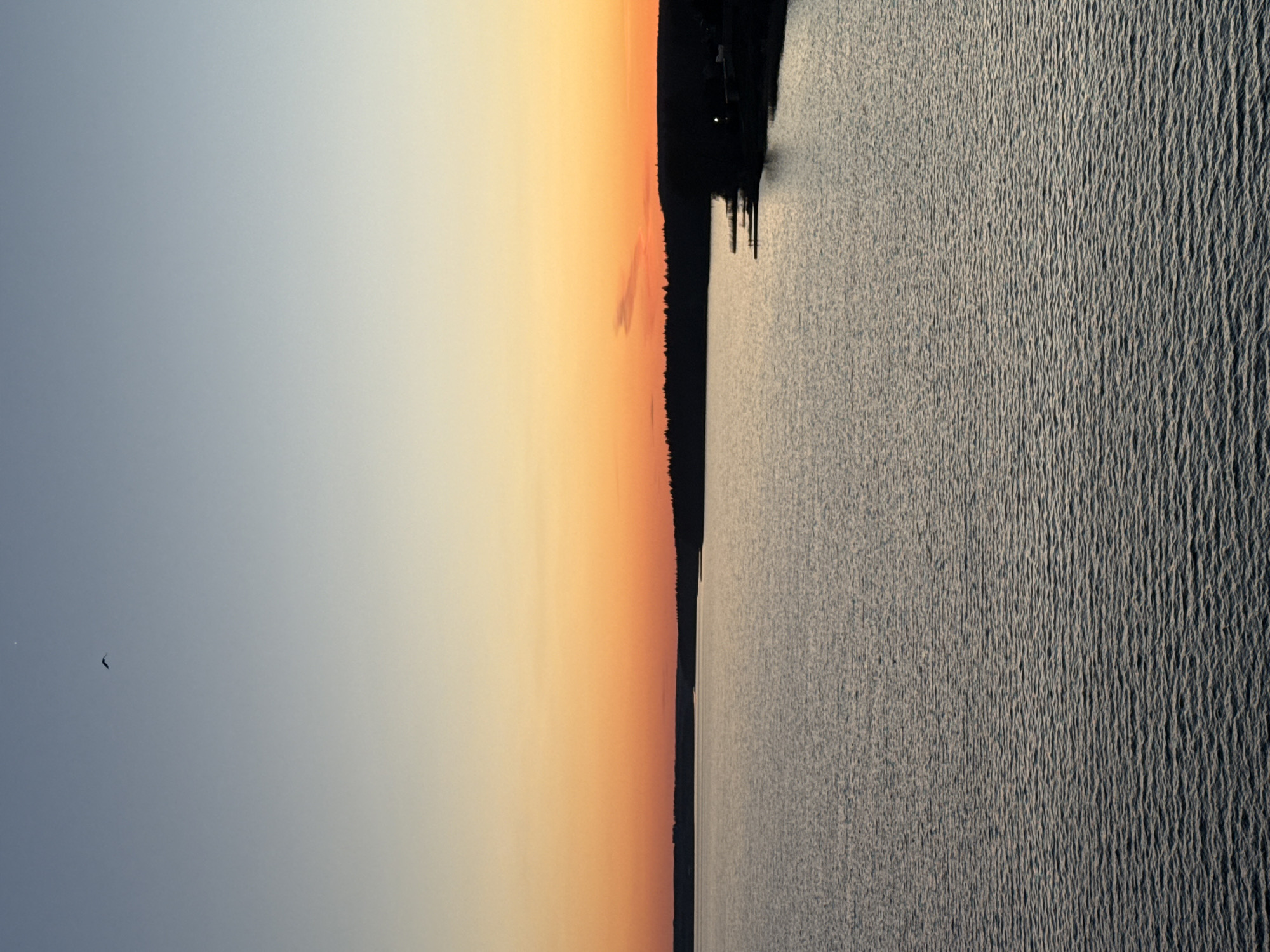 Sunset observed over water near Votkinsk, Russia