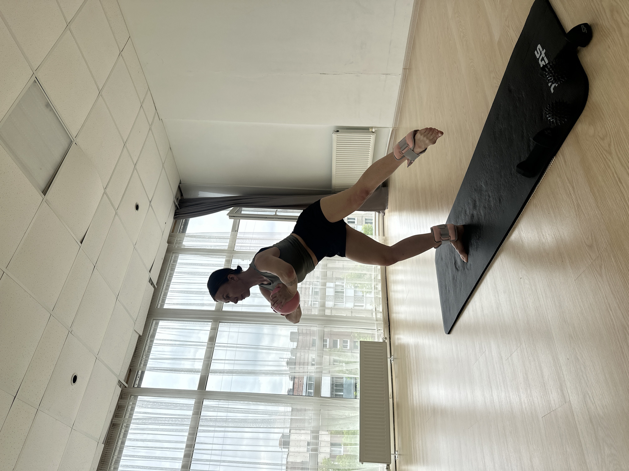 Pilates session with ankle weights and balance work in Votkinsk studio