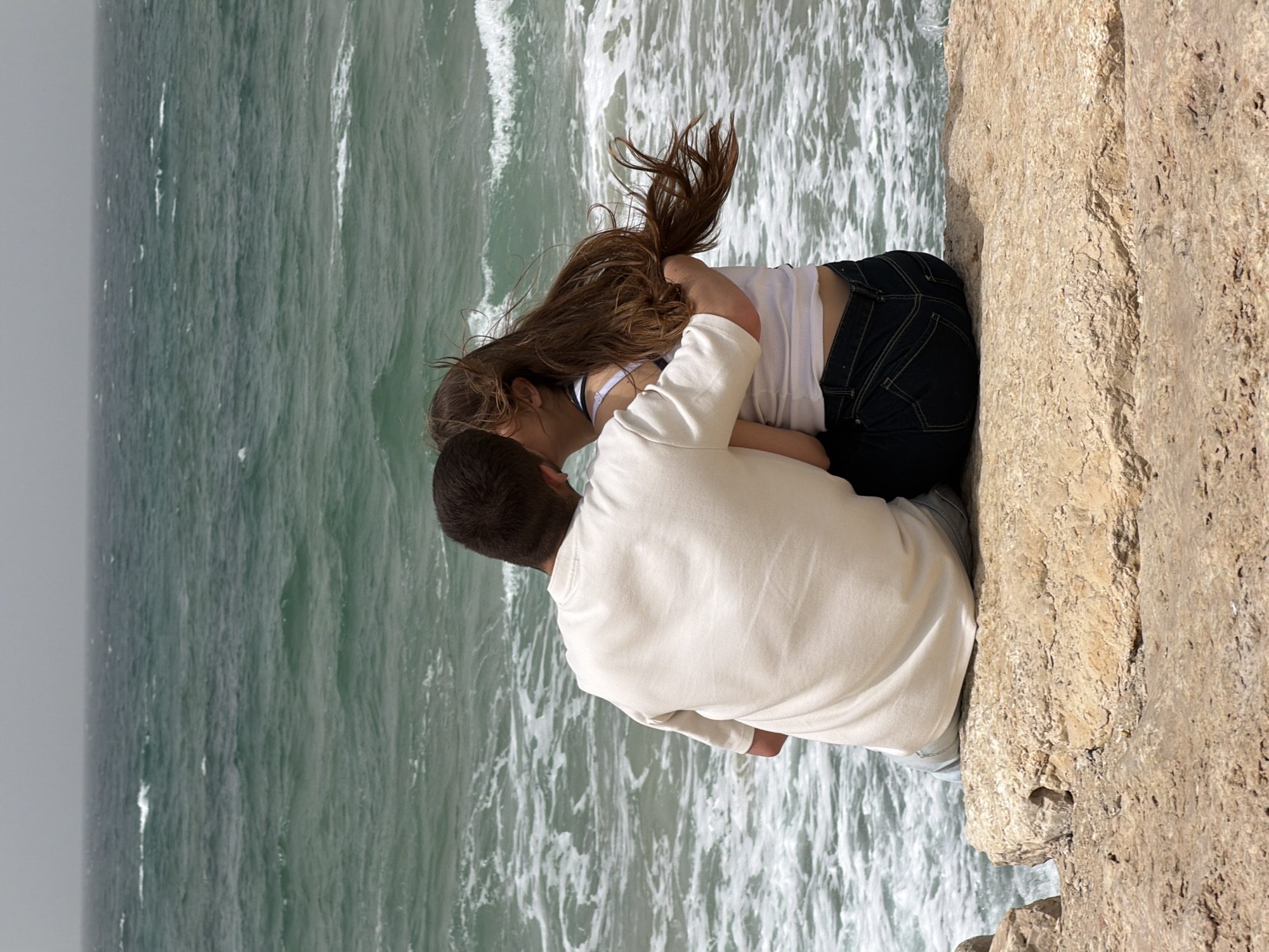 Romantic moment and kite flying captured along Tel Aviv coast