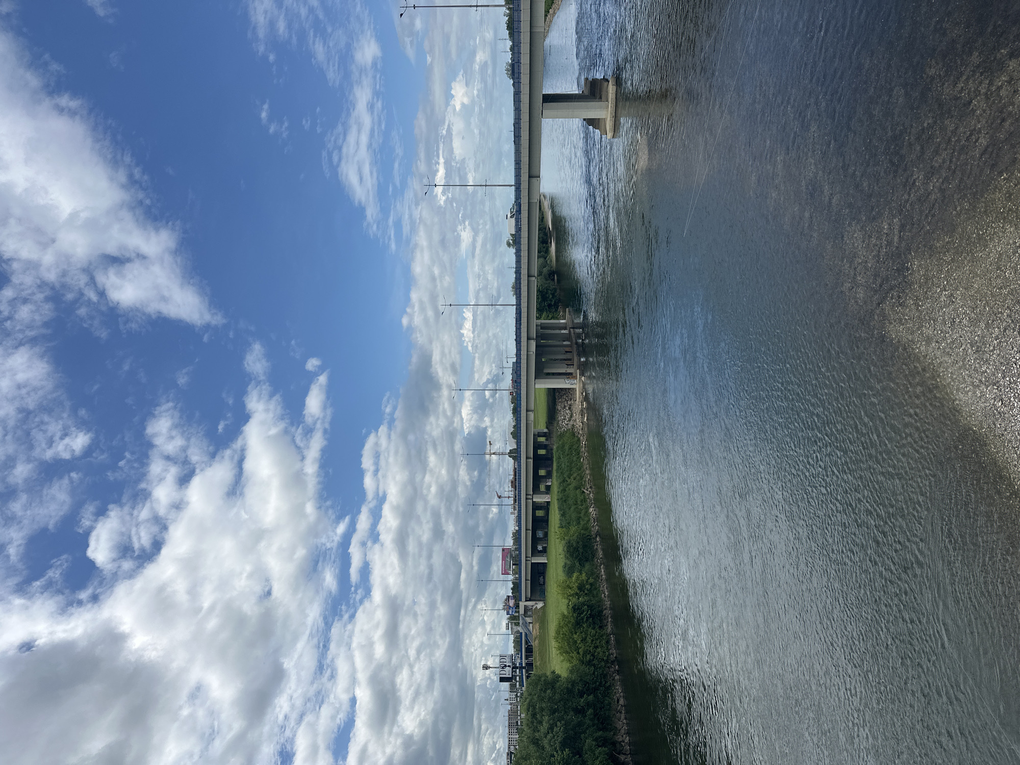 Bridge and clouds reflected in Zagreb river scene
