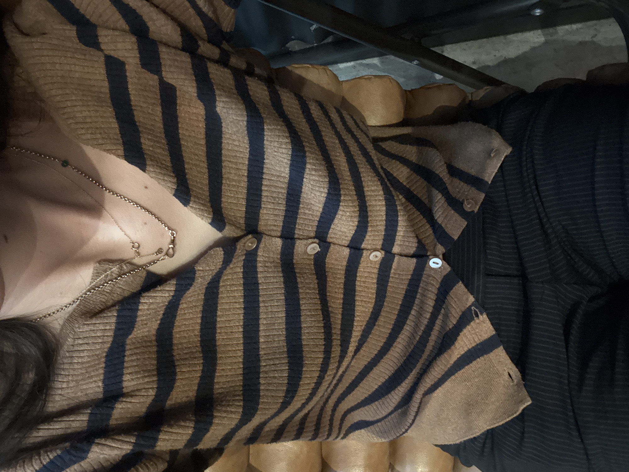 Person in striped cardigan observed in New York