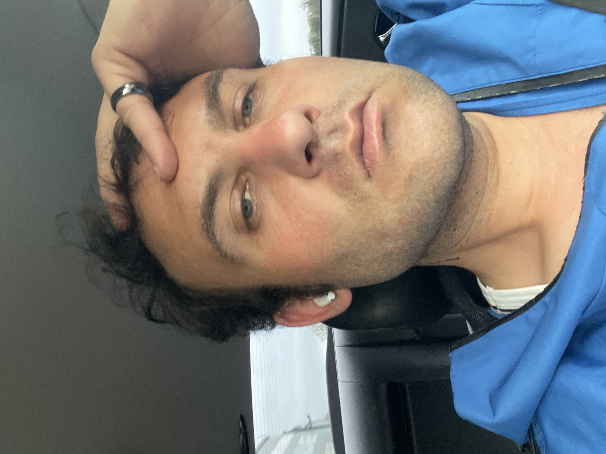 Man photographed with hand on forehead in Mountnorris