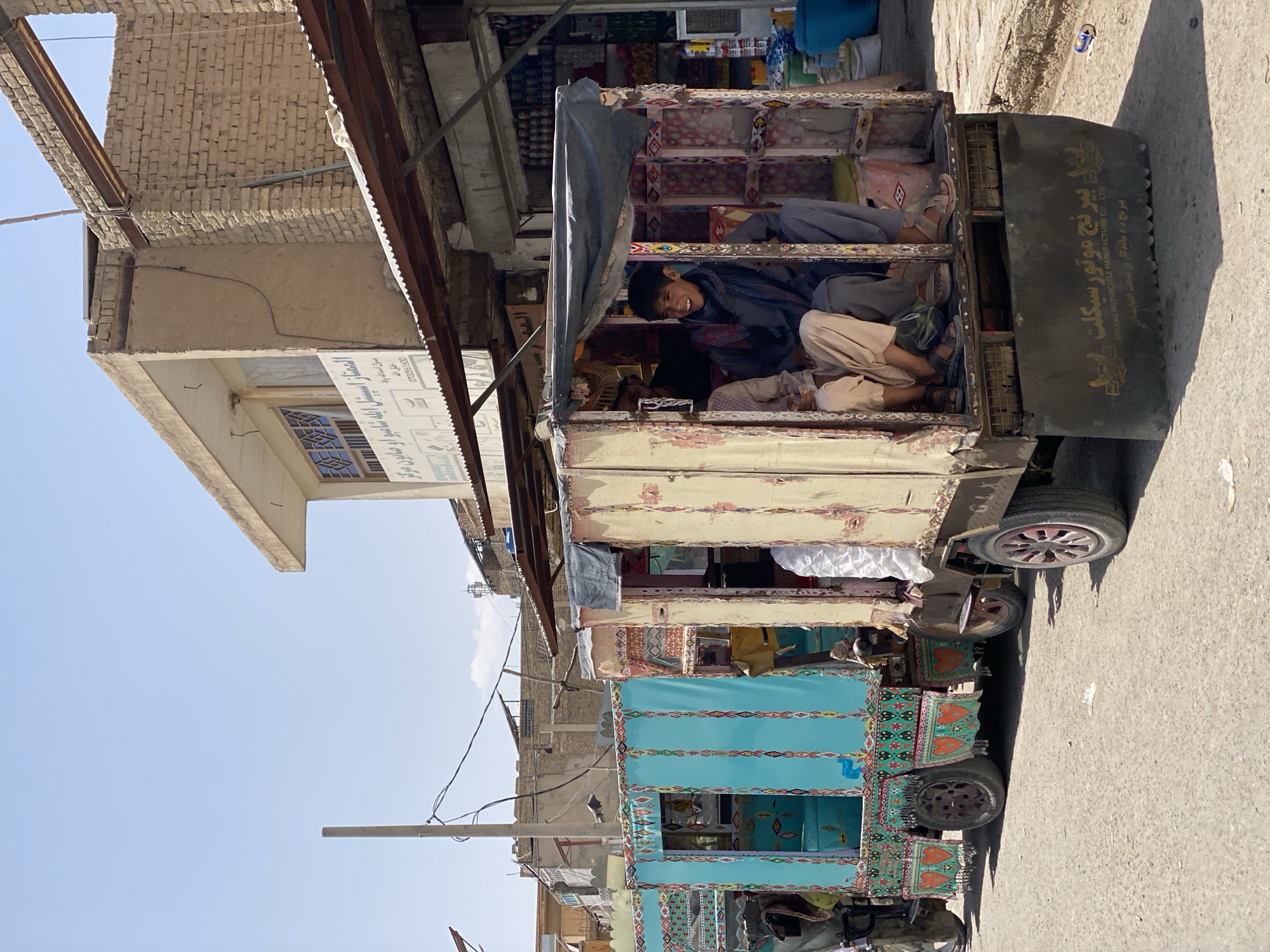 Street life and market activity in Kandahar on a summer morning