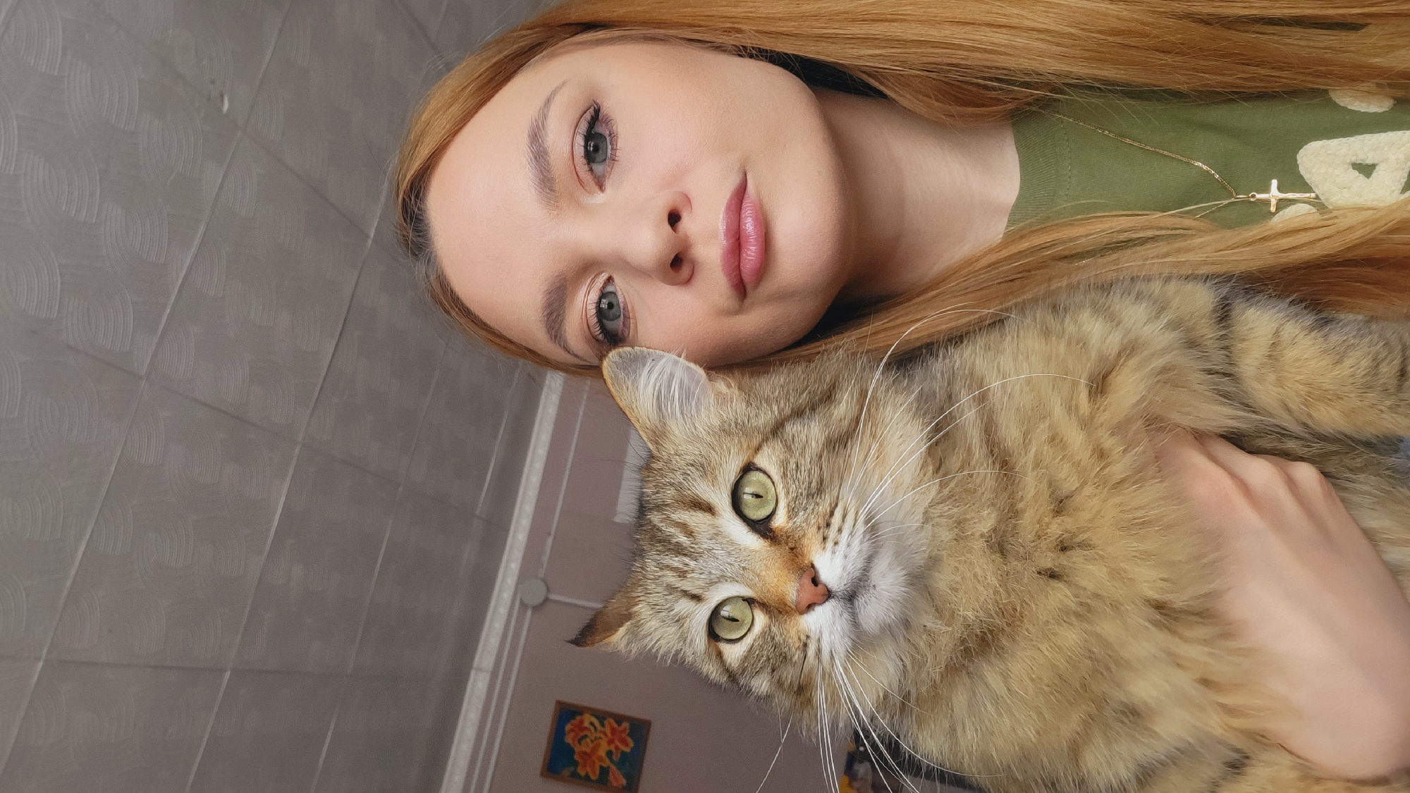 Woman takes selfies in early morning in Зипуново, Russia