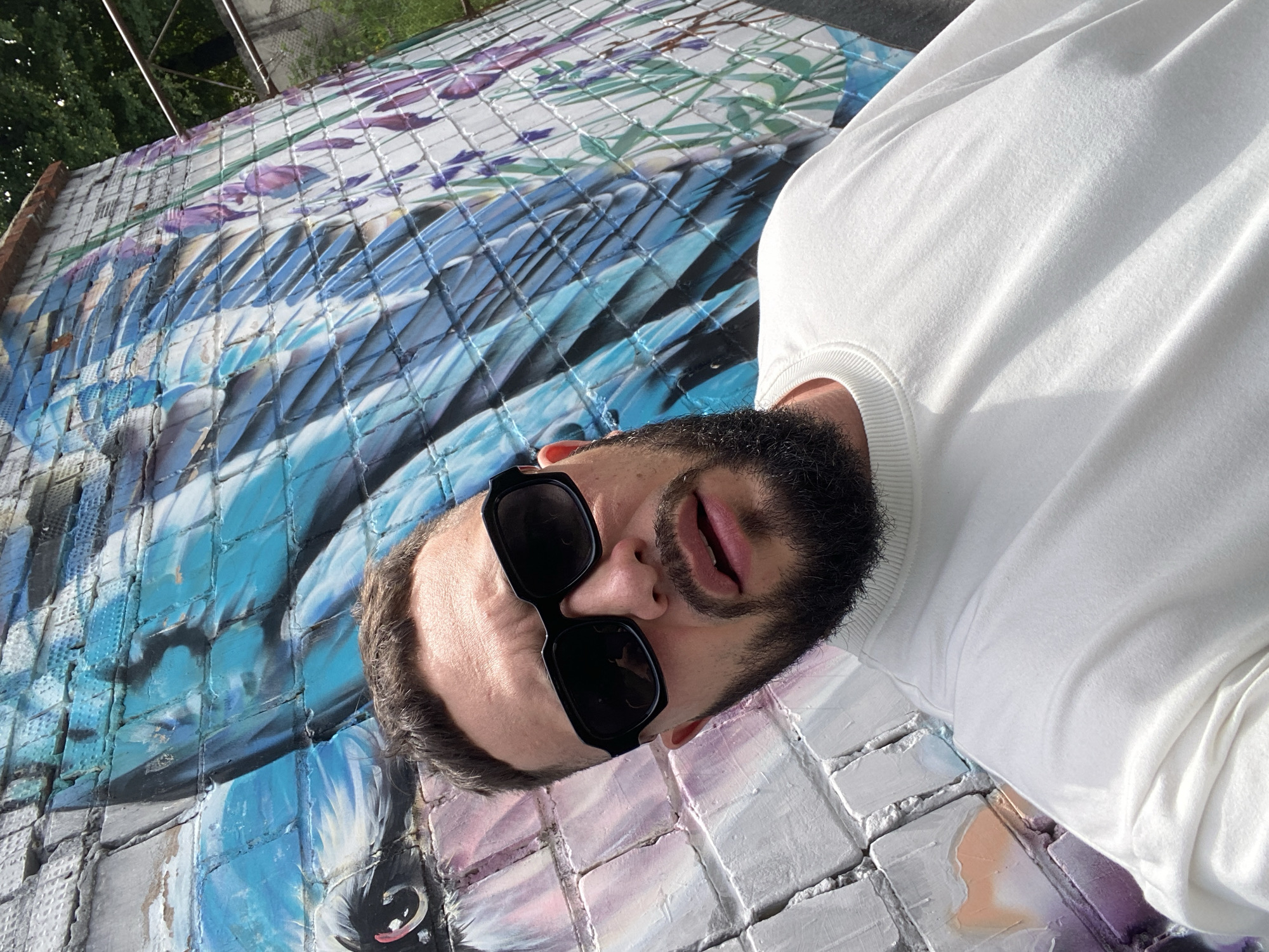Selfies at a graffiti wall, with a cafe stop in Chaikovsky