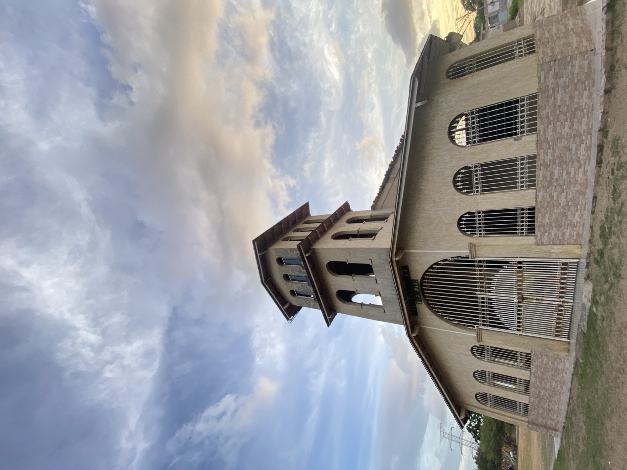 Sunset colors and a church tower in Juan Griego