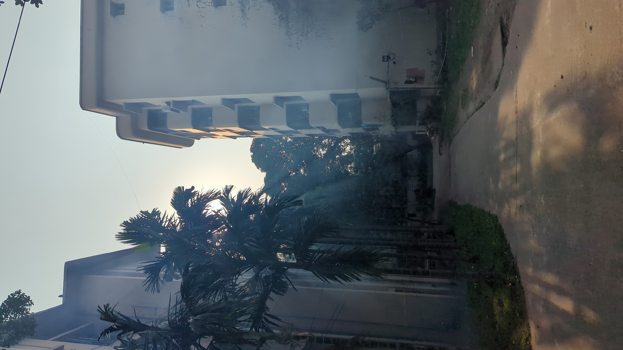 Man operates fogging equipment on Dhaka street