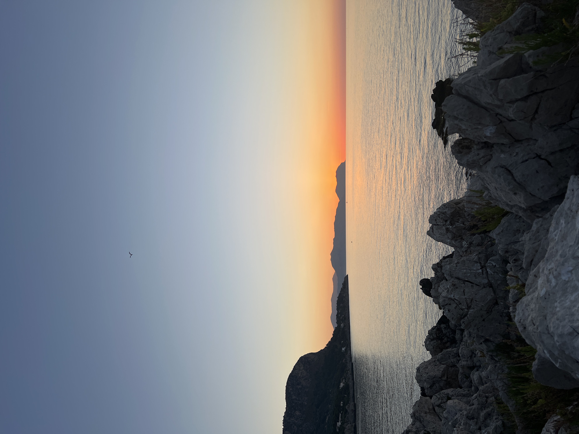 Sunset walk along the Sicilian coast near Bagheria's lighthouse