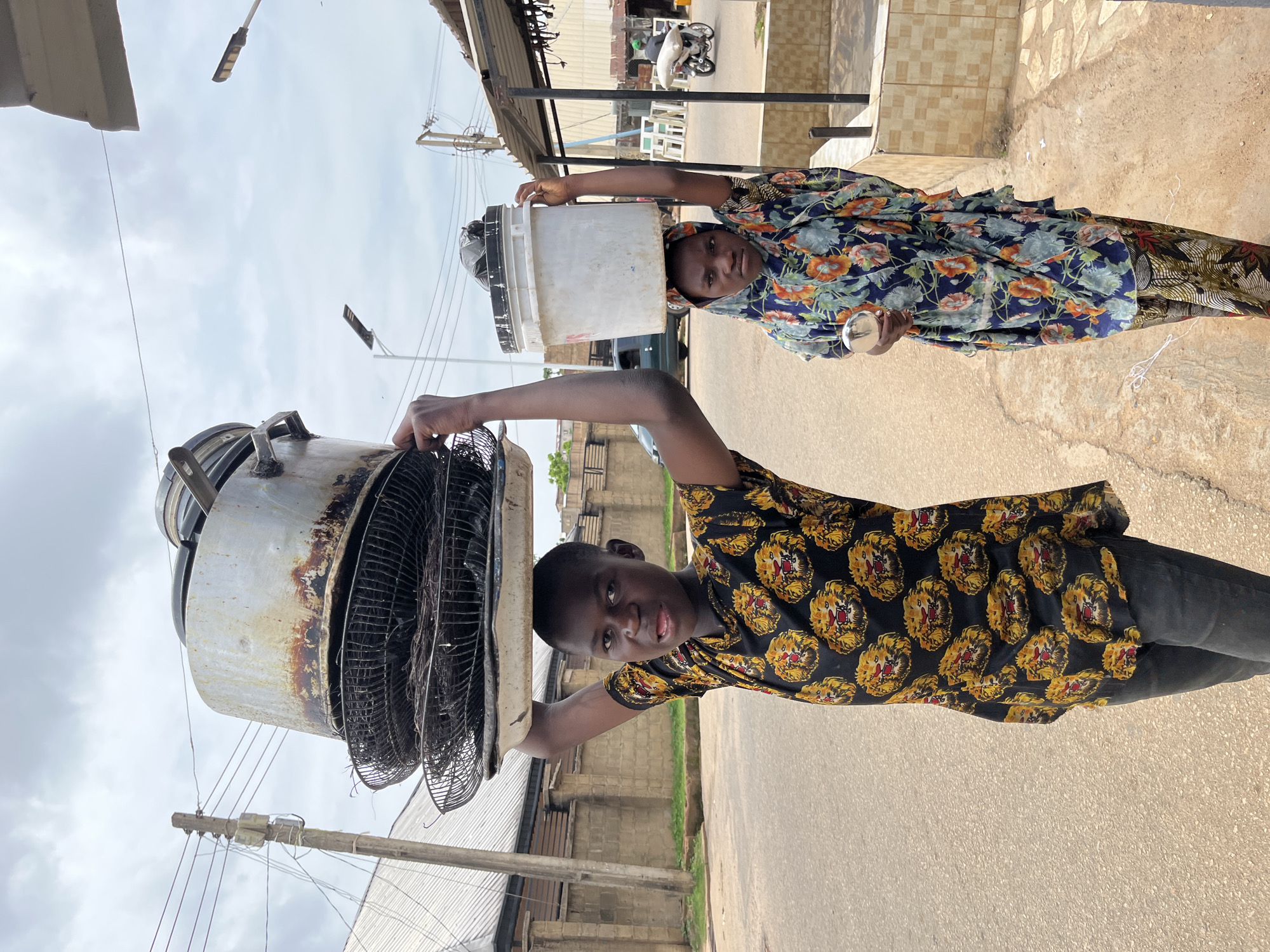 Morning street life documented across Jos, Nigeria neighborhoods