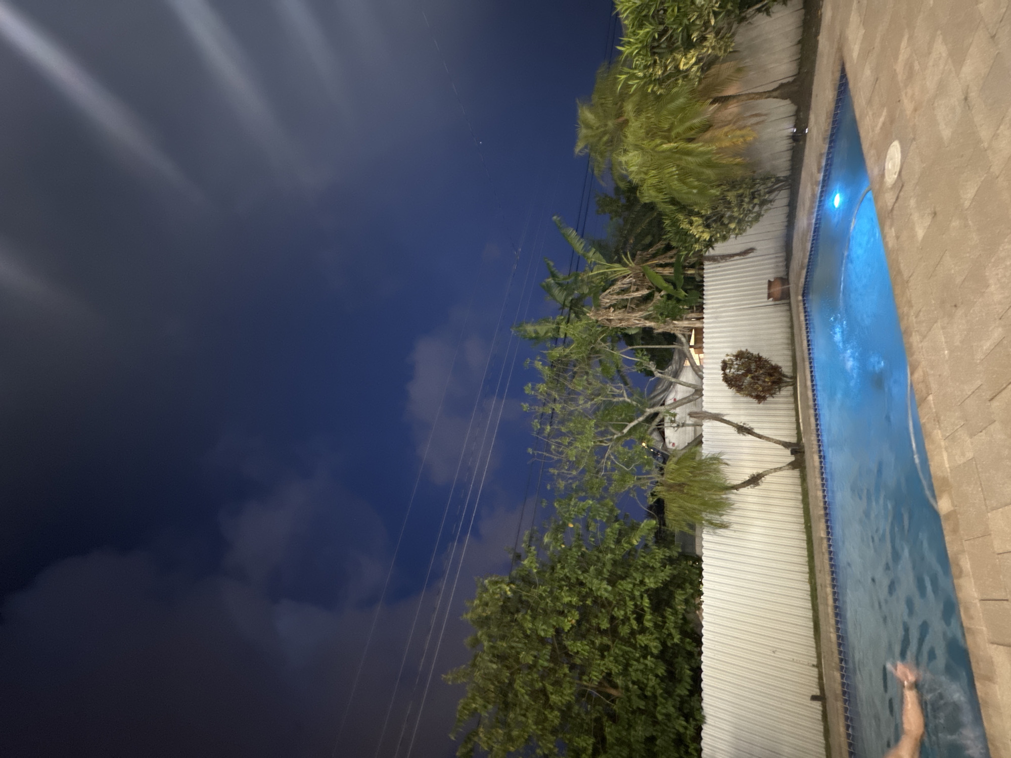 Miami residential pool area captured during late night hours