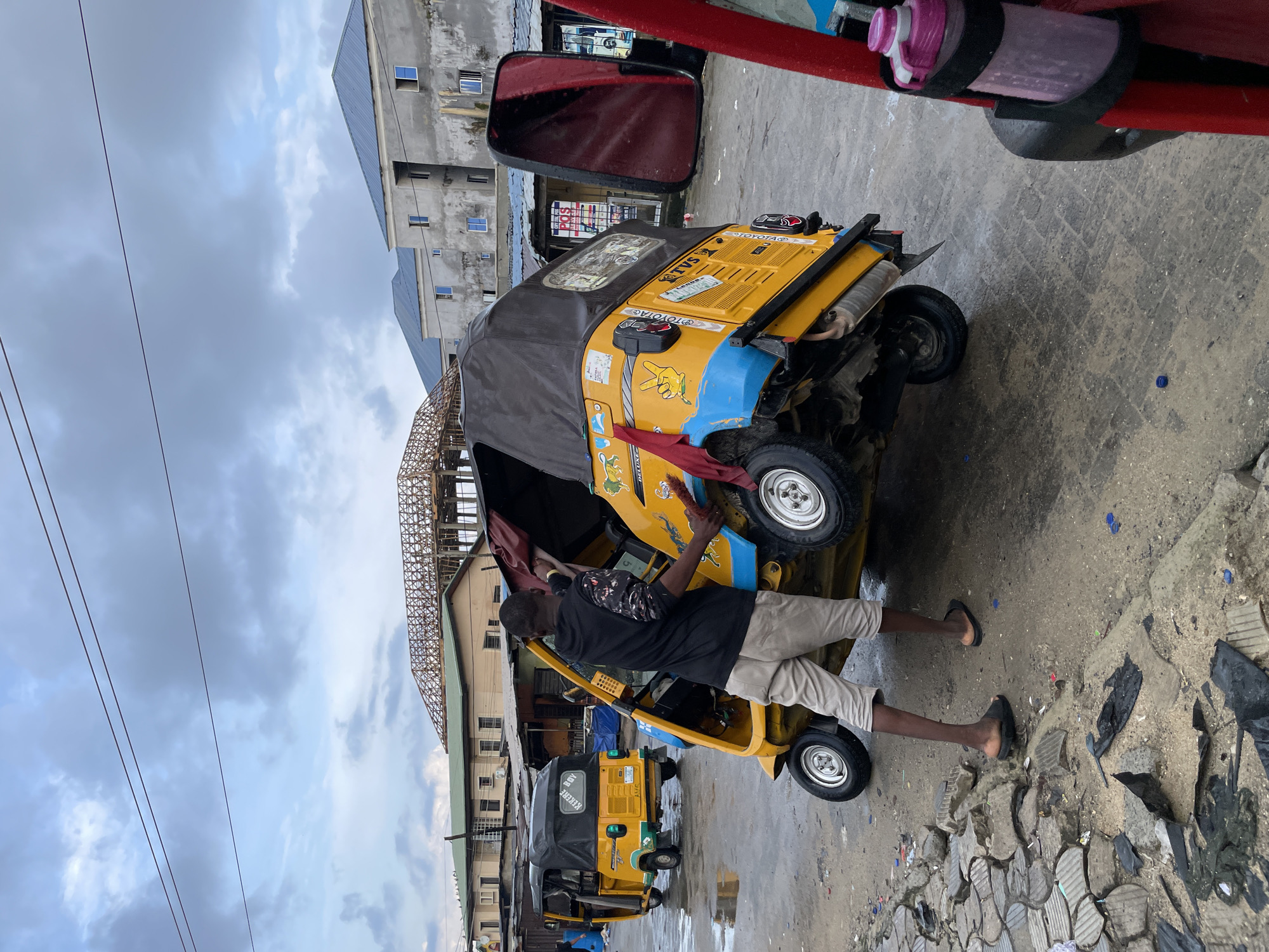 Morning street documentation in rainy Ado, Nigeria