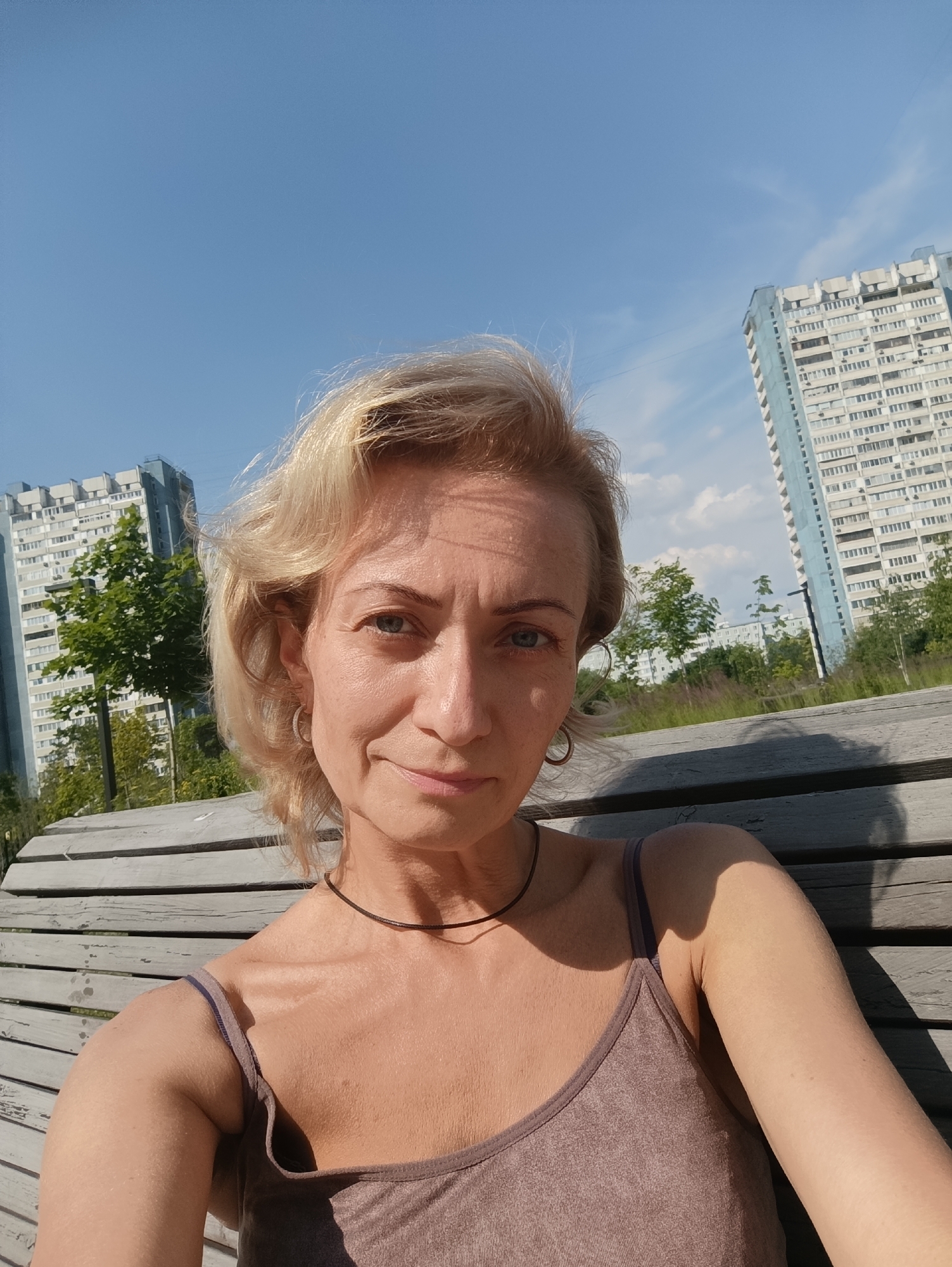 Lazy summer afternoon in Moscow, bench selfies and bikes