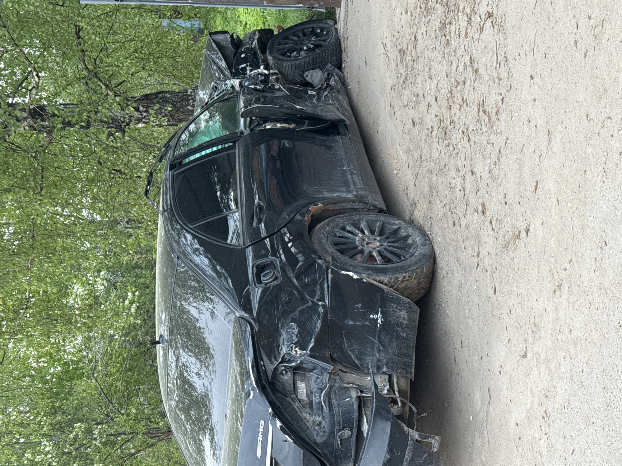 Damaged car, crane, person documented in Dmitrov within minutes