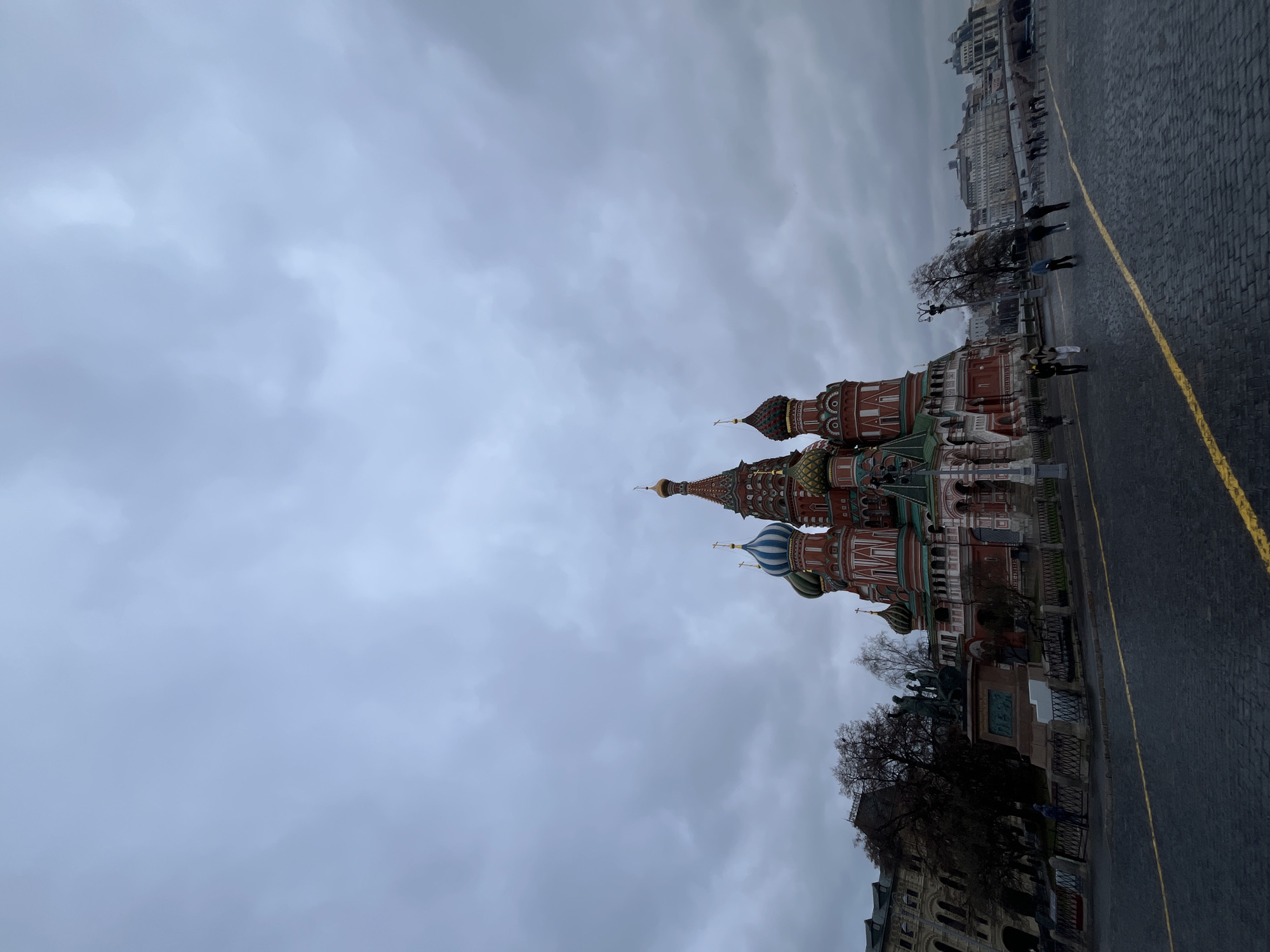 Tourist captures Red Square landmarks during Moscow afternoon visit