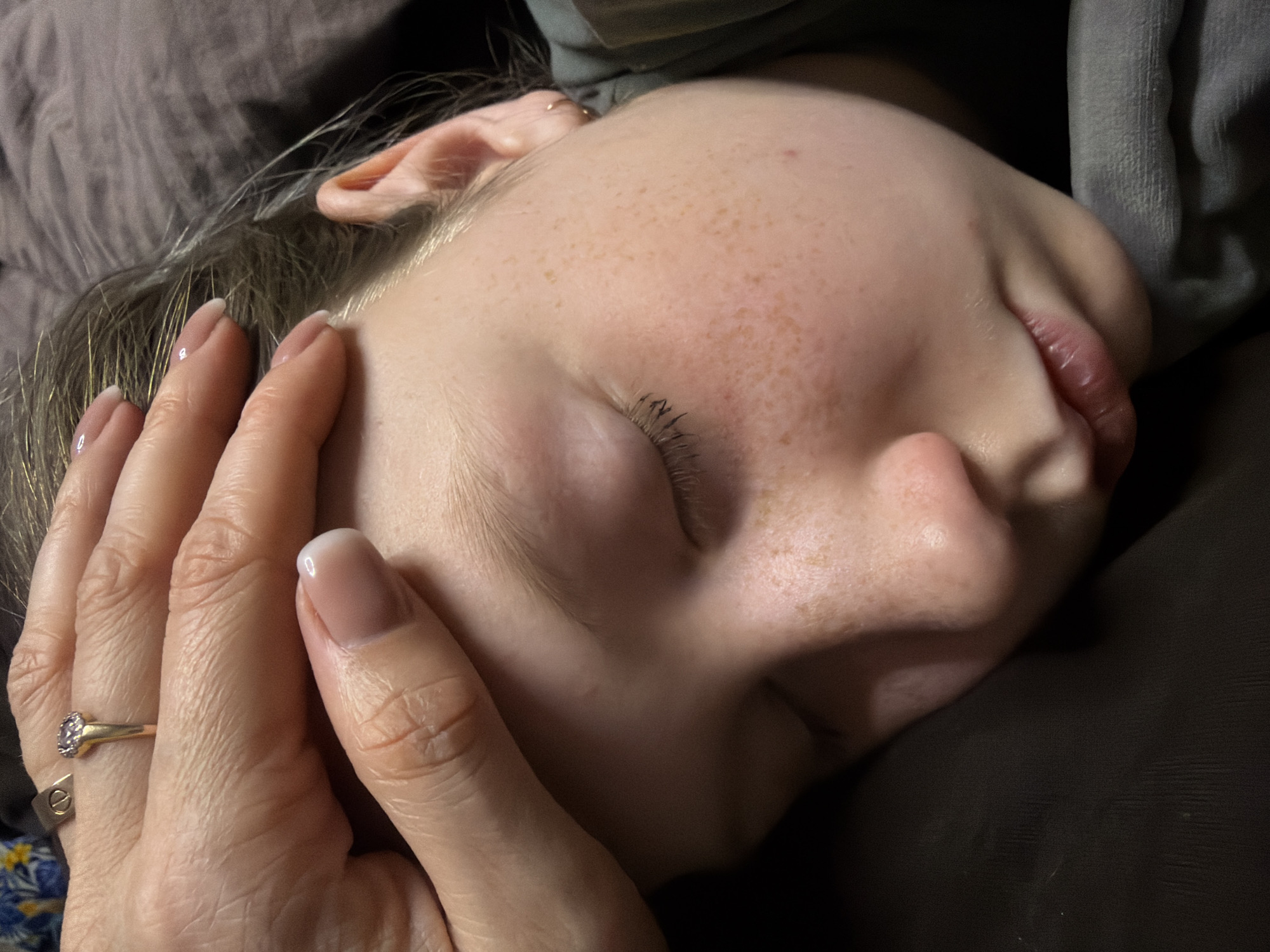 Tender moment captured with sleeping child in Dubovaya, Russia