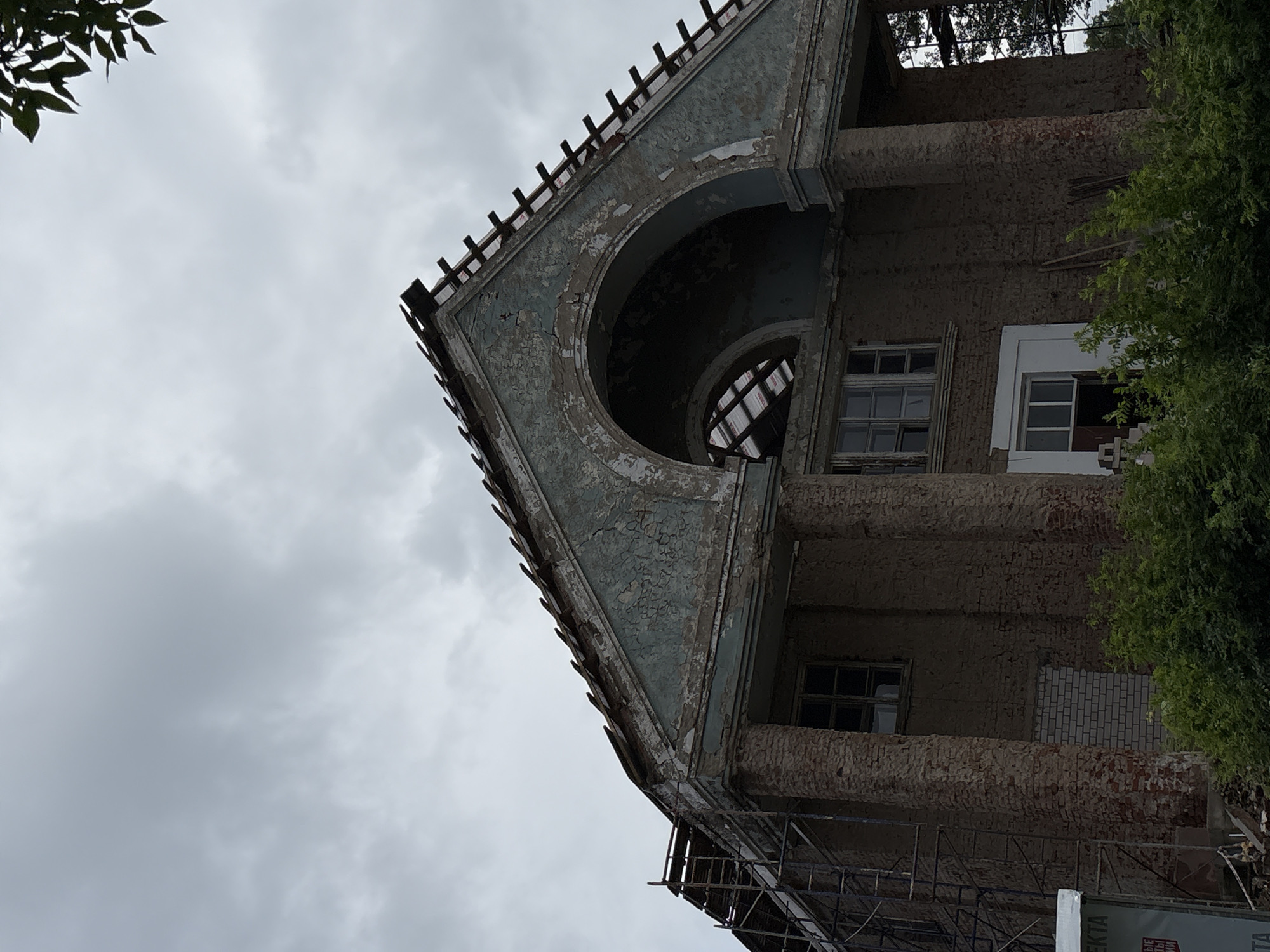 Soviet-era town in slow renovation, war memorials and wooden houses