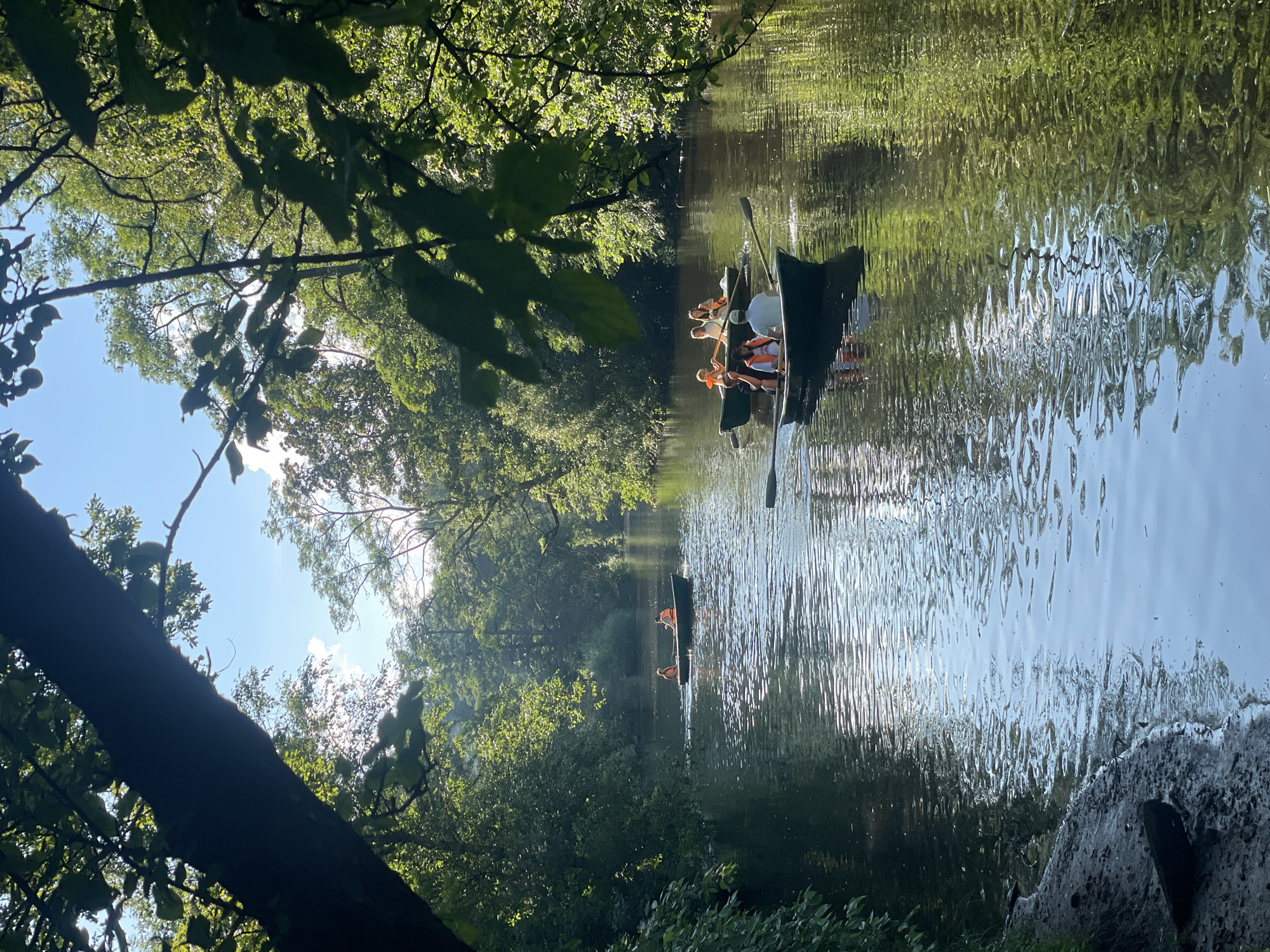 Rowboats, crowds, and street performers on a Saint Petersburg summer afternoon