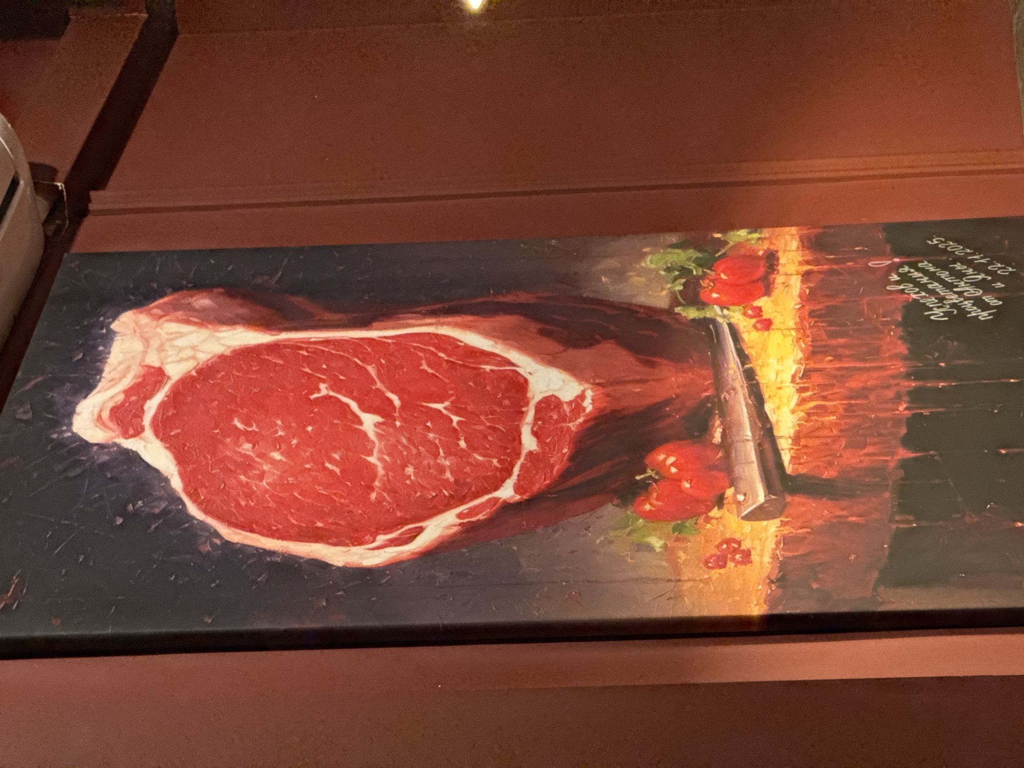 Interior scenes documented at Izhevsk gastropub featuring art and photographs