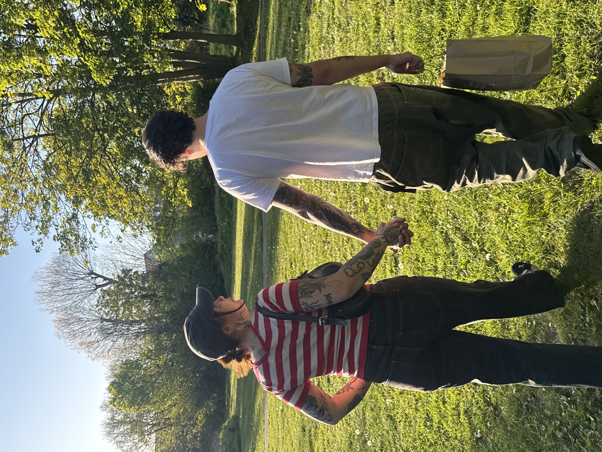 Couple spotted in London park on sunny afternoon