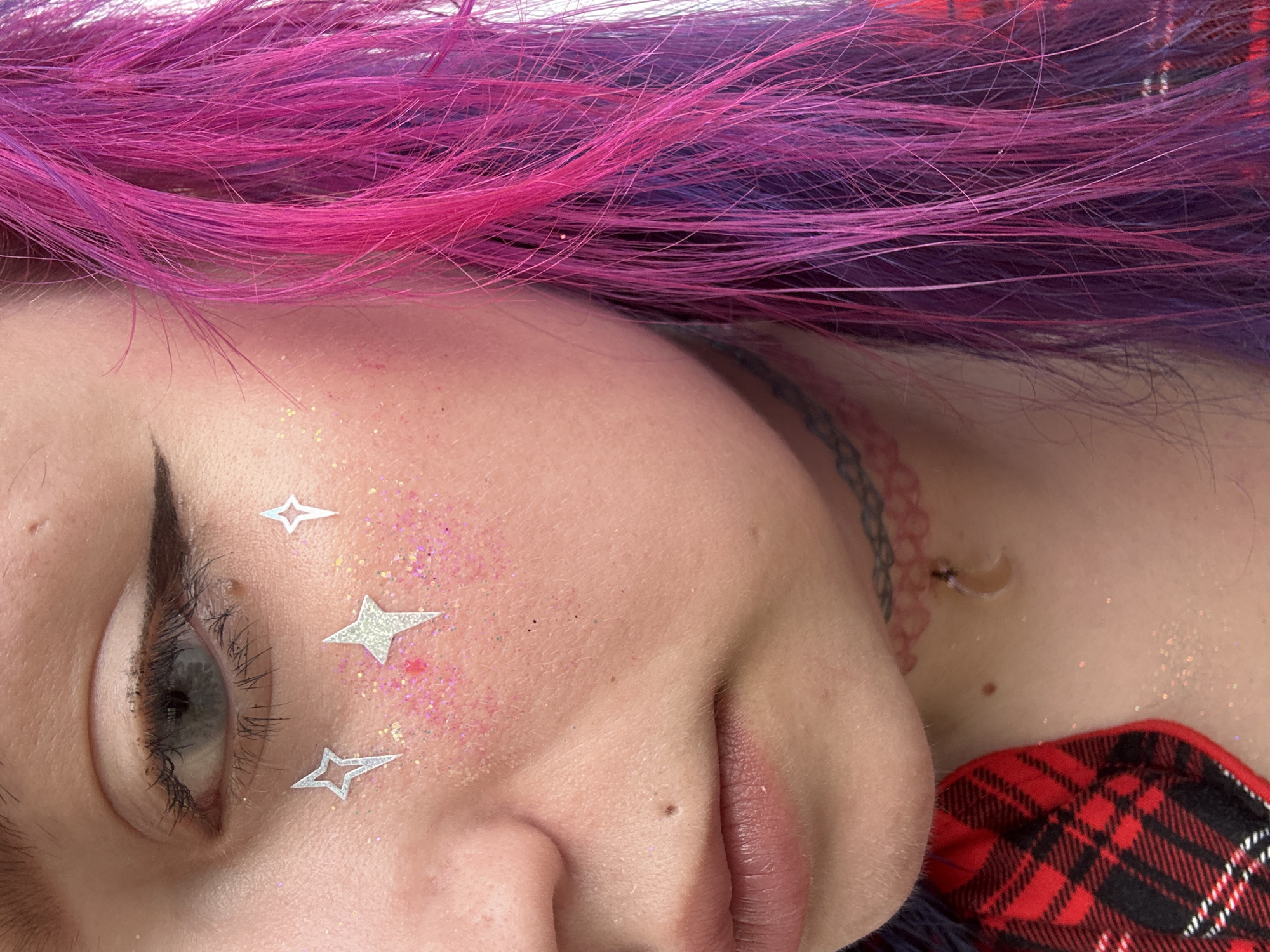 Bold pink and purple hair in a close-up Nha Trang portrait