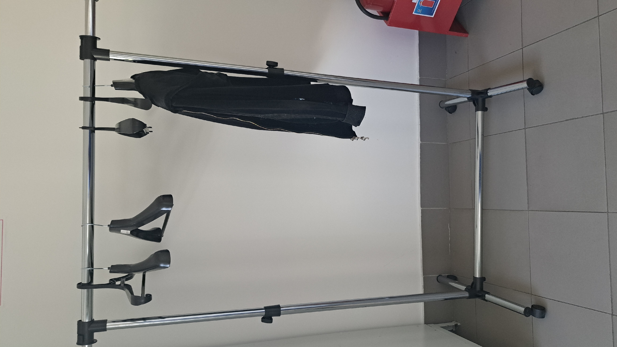 Clothing rack and calculator spotted at Lytkarino commercial space