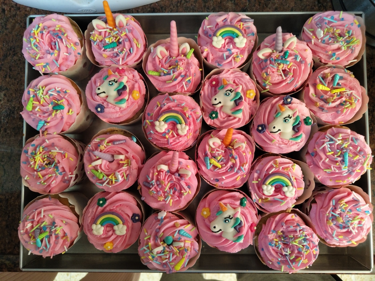 Decorated unicorn cupcakes displayed at Tel Aviv bakery