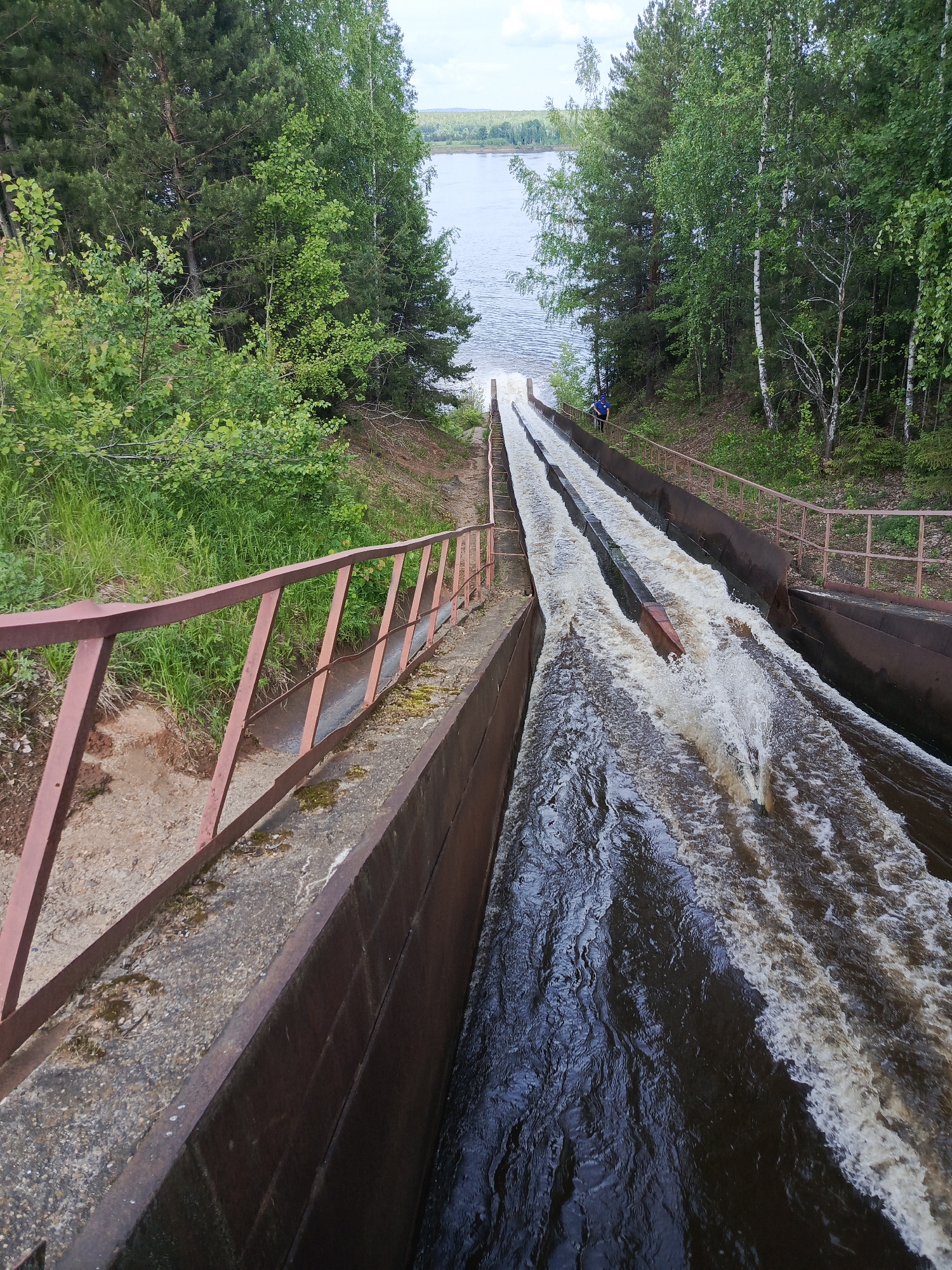 Visitors document water infrastructure at Chernushka dam facility