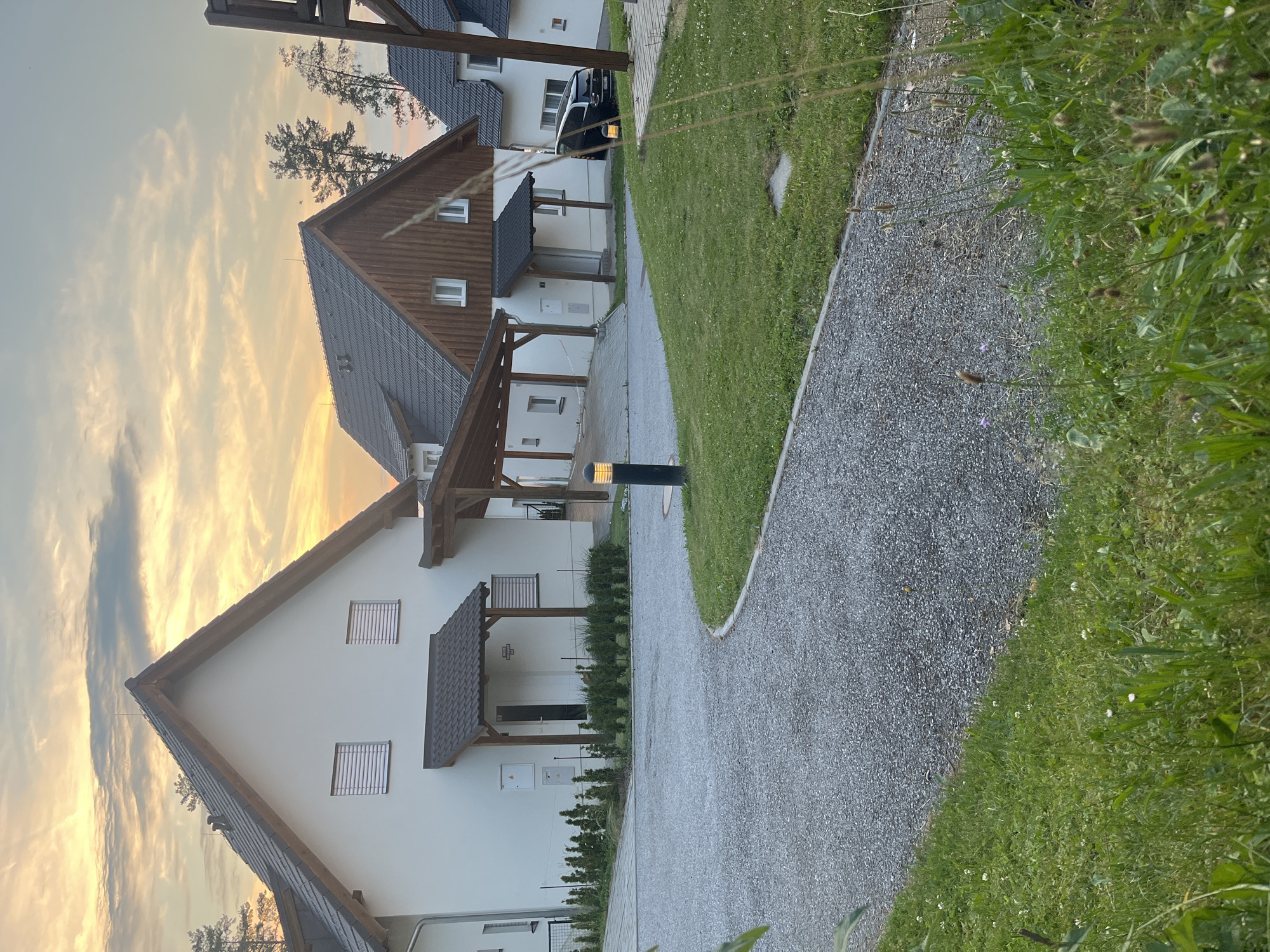 Backyard BBQ evening at a lakeside property in Milná