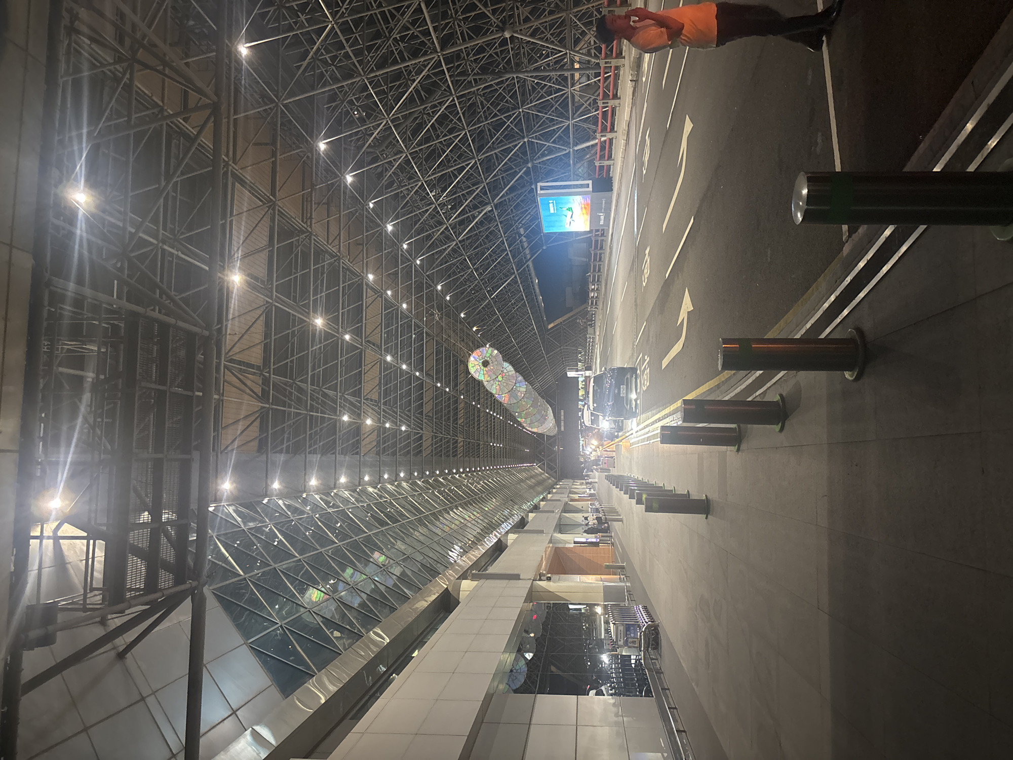 Airport terminal interior documented in Taoyuan City at night