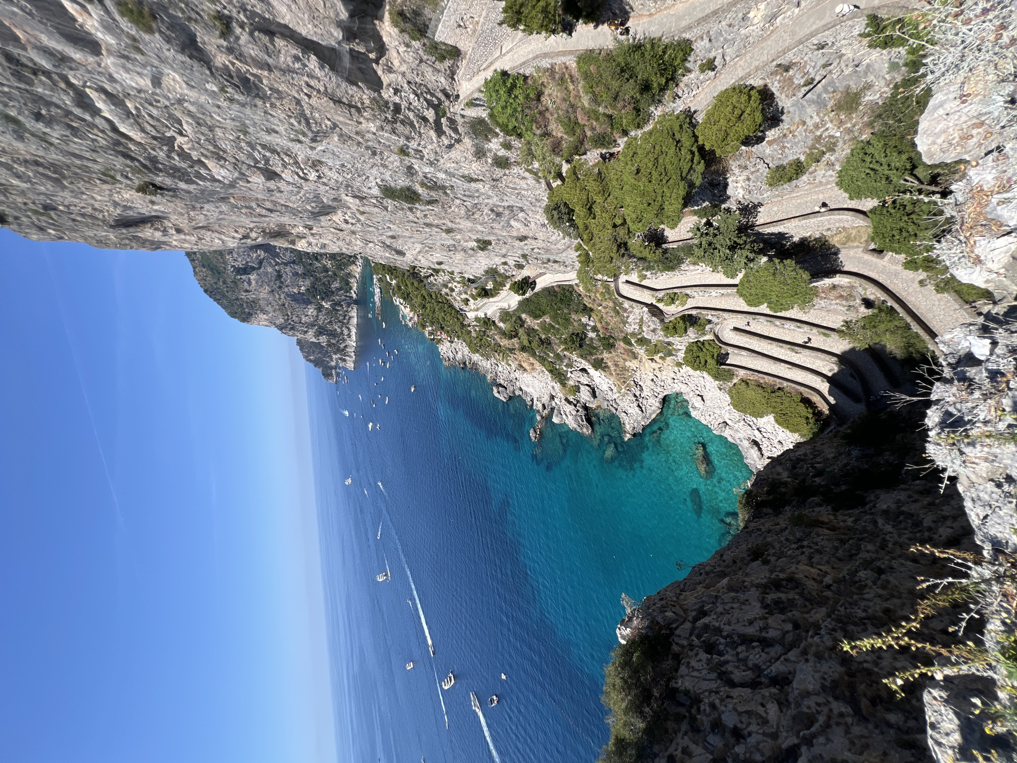 Tourist documents scenic hour-long exploration of Capri's coastline and gardens